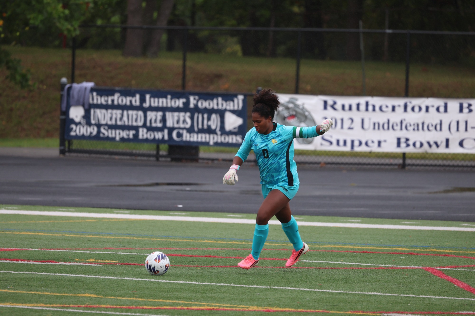 Goalkeeper Isabella Riollano Kicking the Ball