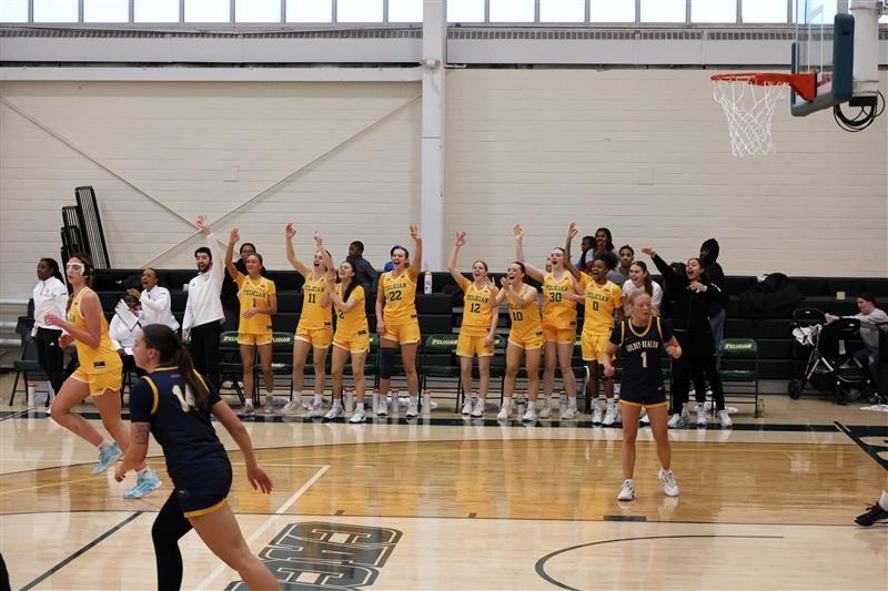 Team celebrating on bench