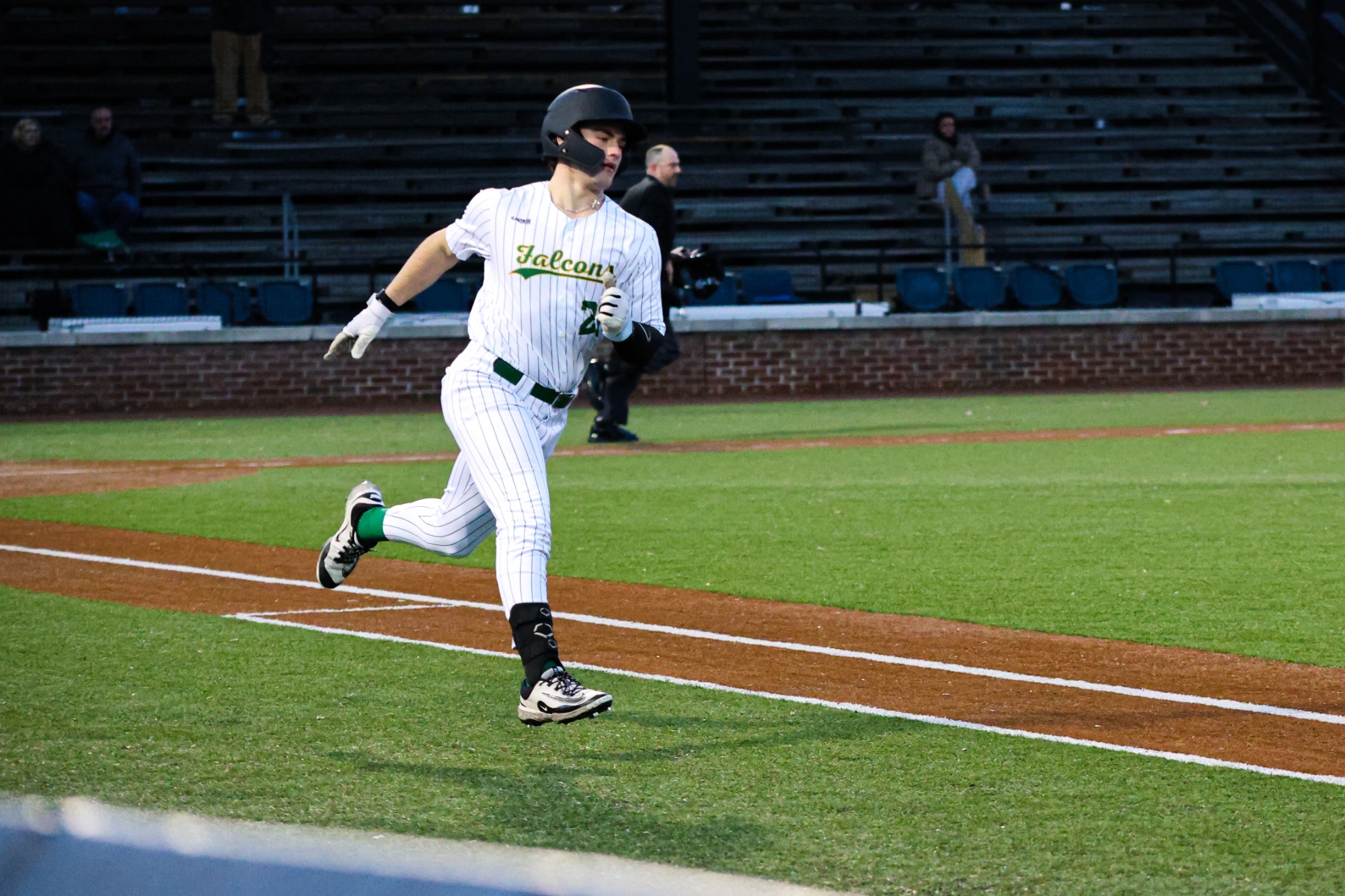 Brandon Petrick runs to first base. 