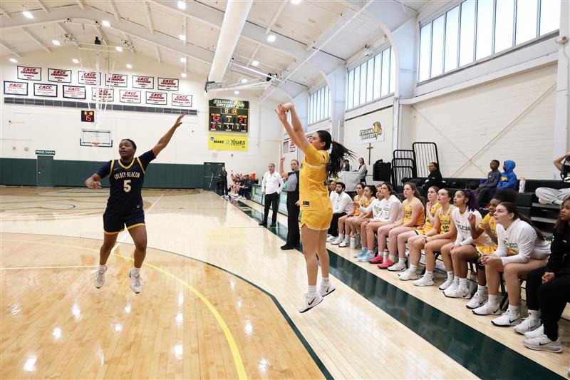 Karla Barreno shooting a three-pointer