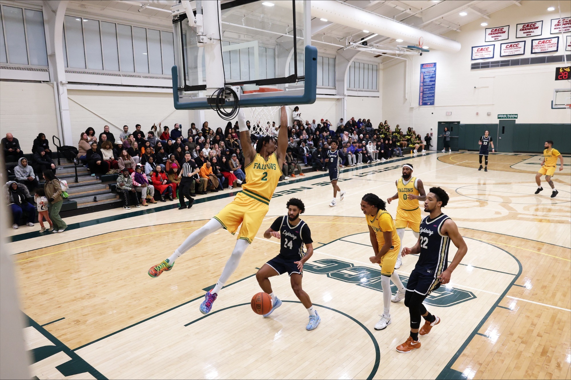 Jared White dunking in game against Goldey Beacom.