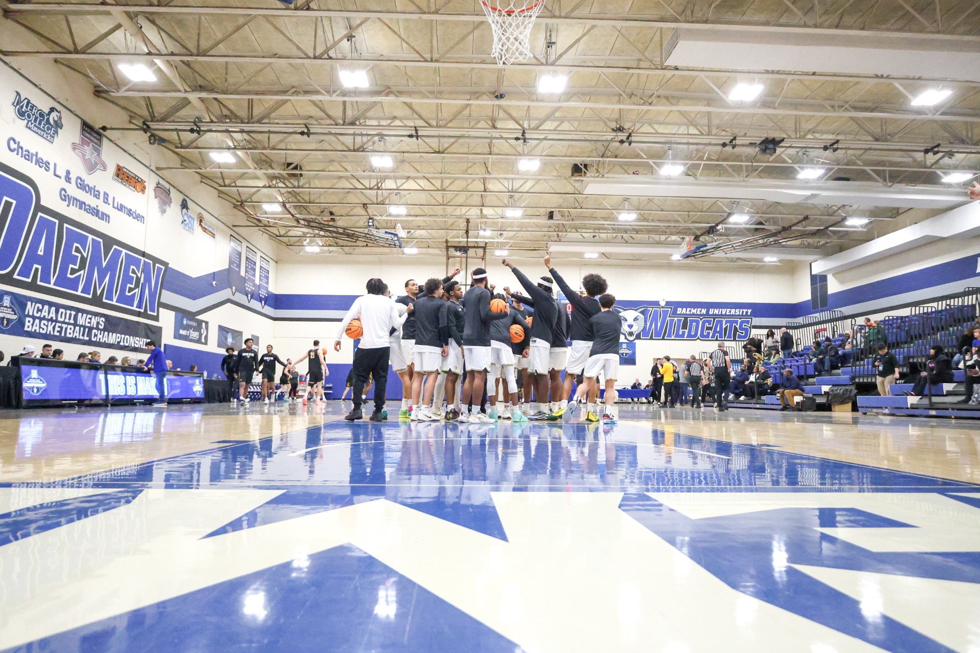 Team huddle before NCAA Round of 64.