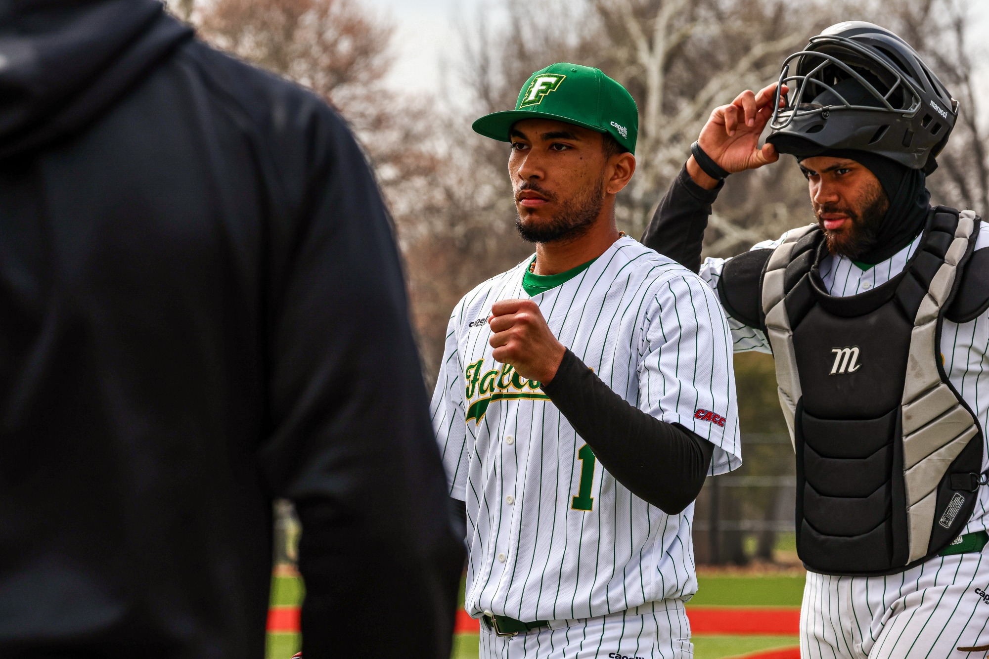 Sadier Vicioso walks back to the dugout after shutdown.