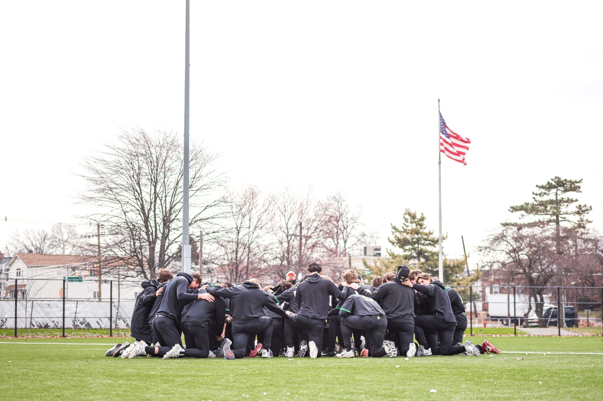 Team prayer prior to first pitch.