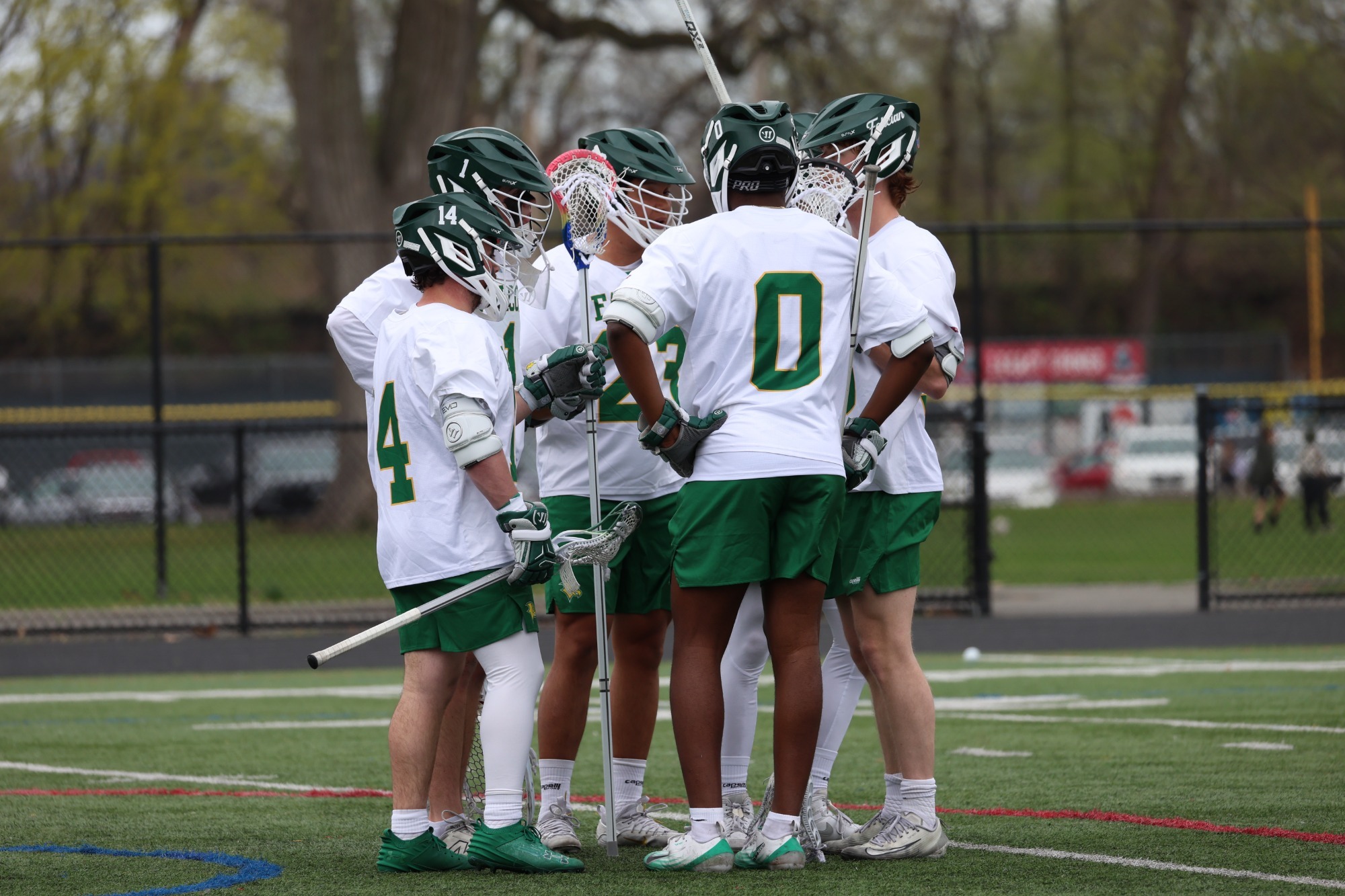 Men's lacrosse Defensive Huddle during a break