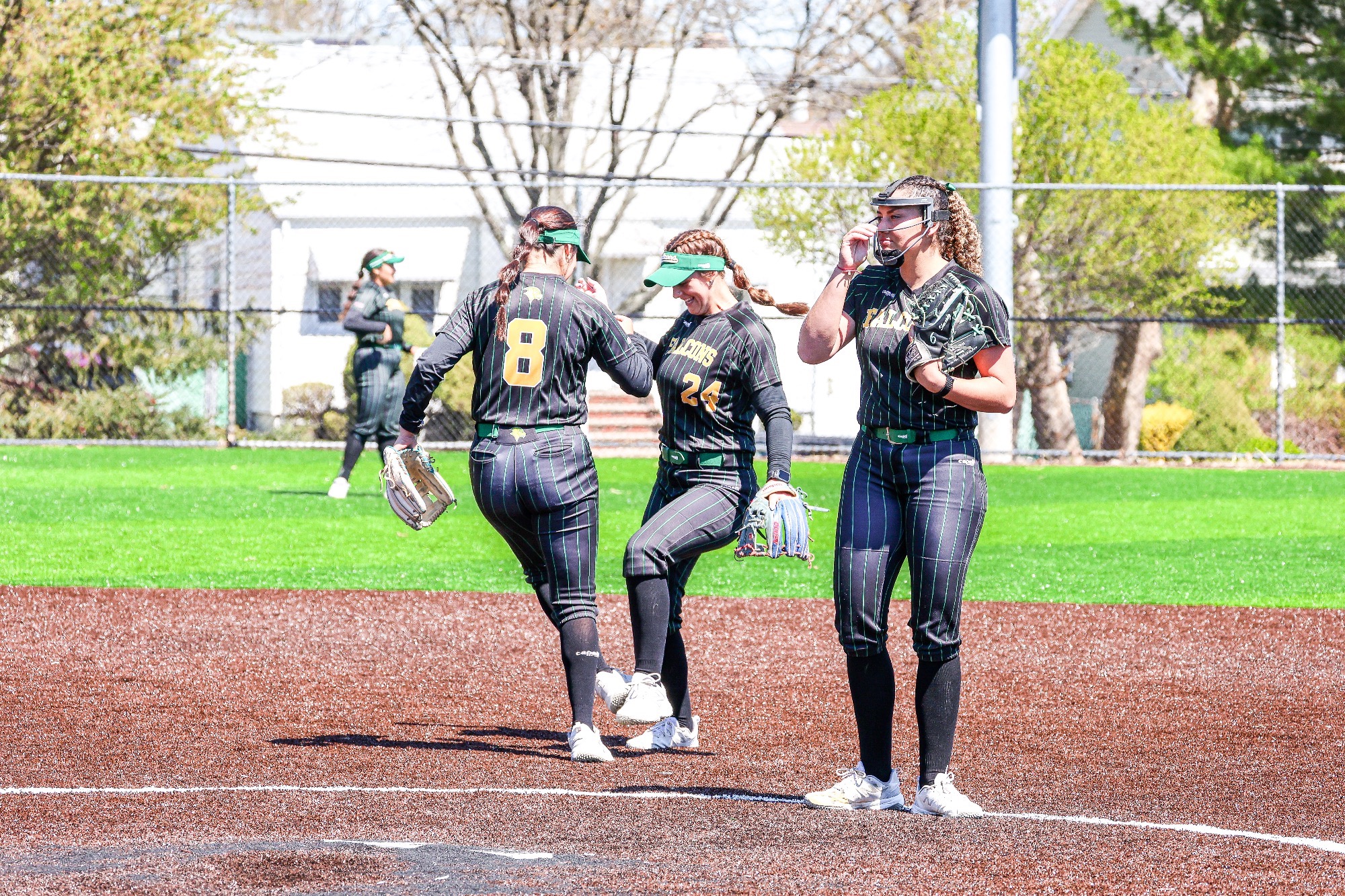 De La Vega and Walling celebrating after a strikeout.