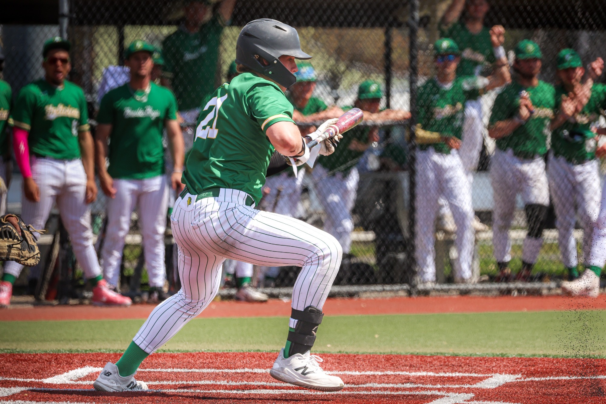 Brandon Petrick laying down a SAC bunt.