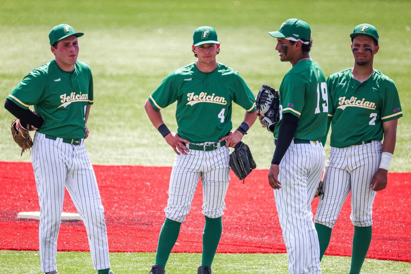 Infield talking during a pitching change. 