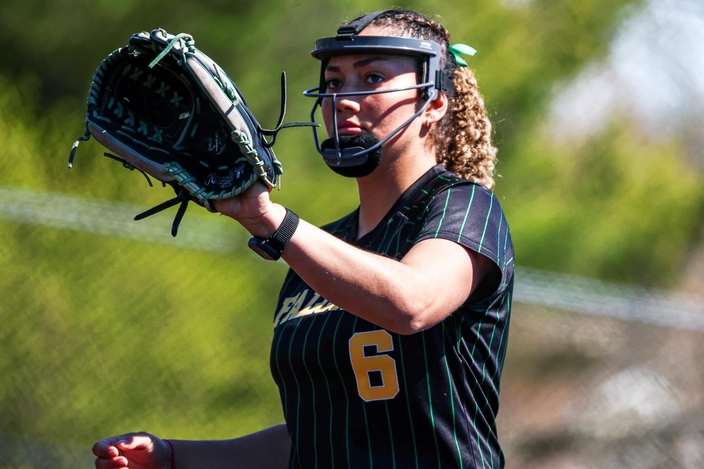 Jocelyn Moody awaits throwback from the catcher.