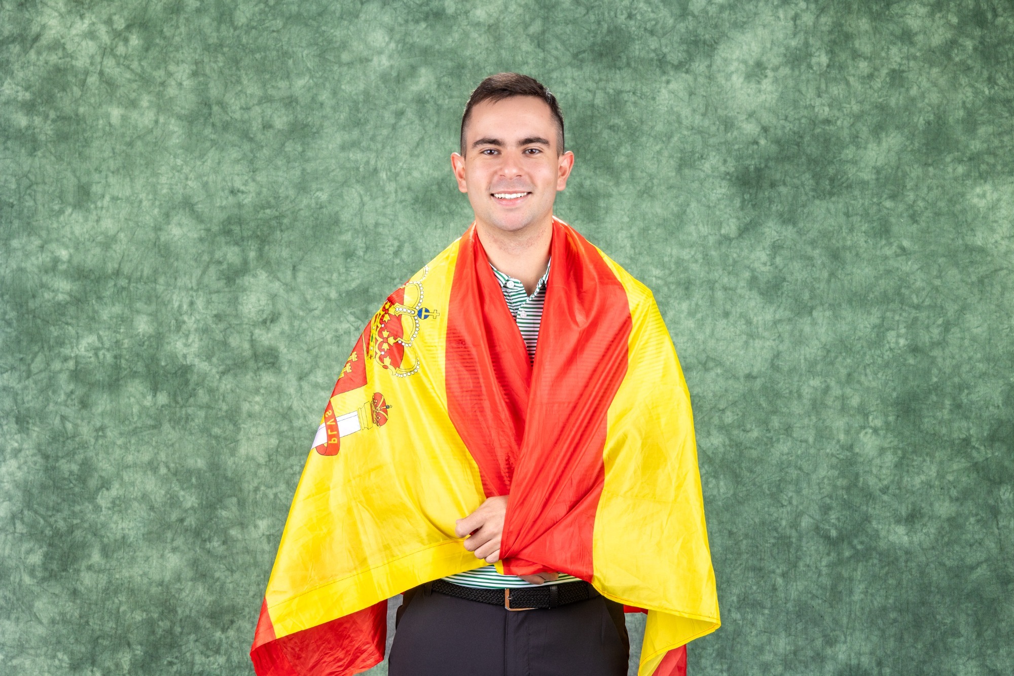 Pablo Hidalgo posing on media day with Spanish flag