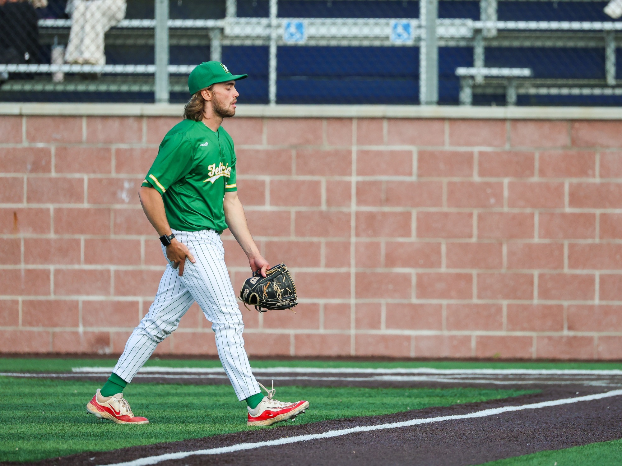 Bazydlo walks towards the dugout after a shutdown inning.