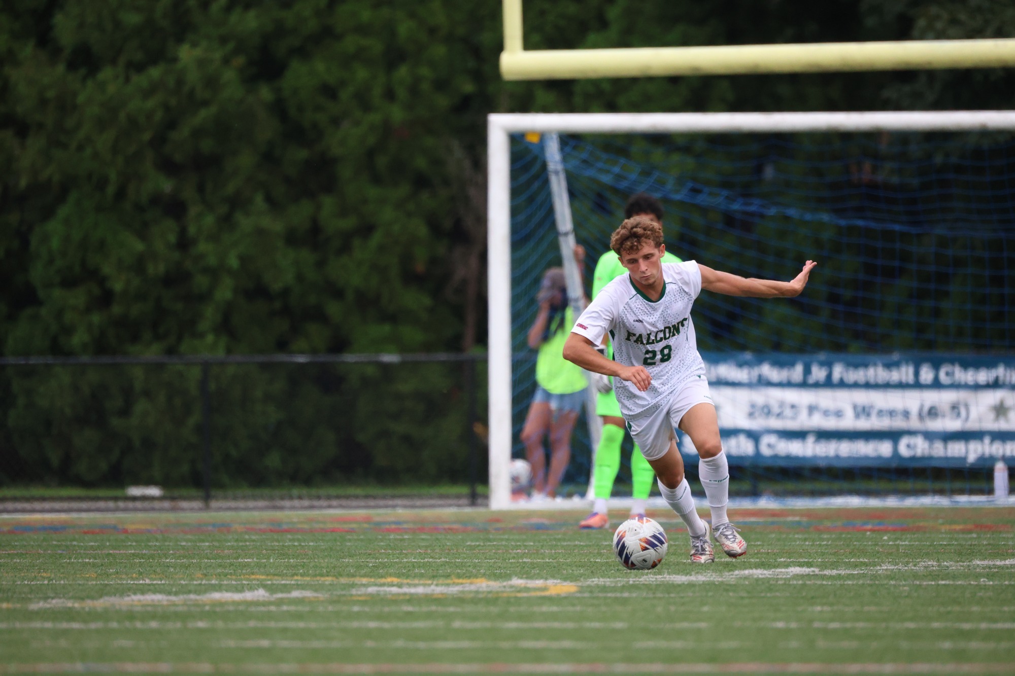 Andre Cunha dribbling up the field