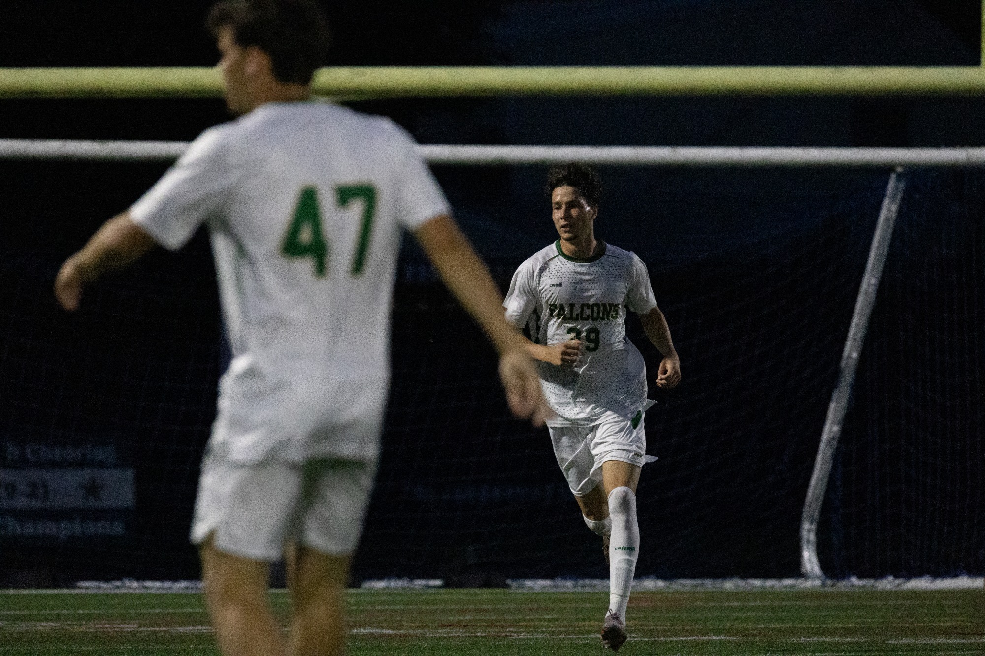 Michel Bose running to midfield
