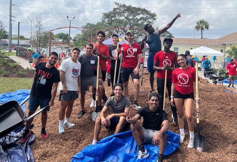 FNU student-athletes and AD at Babcock Park playground build on March 29, 2024
