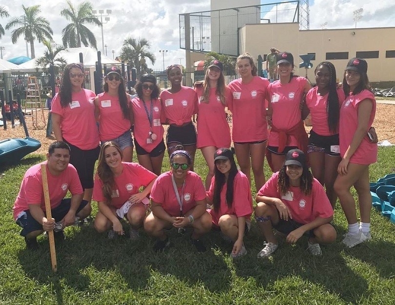 Volleyball team working for the community