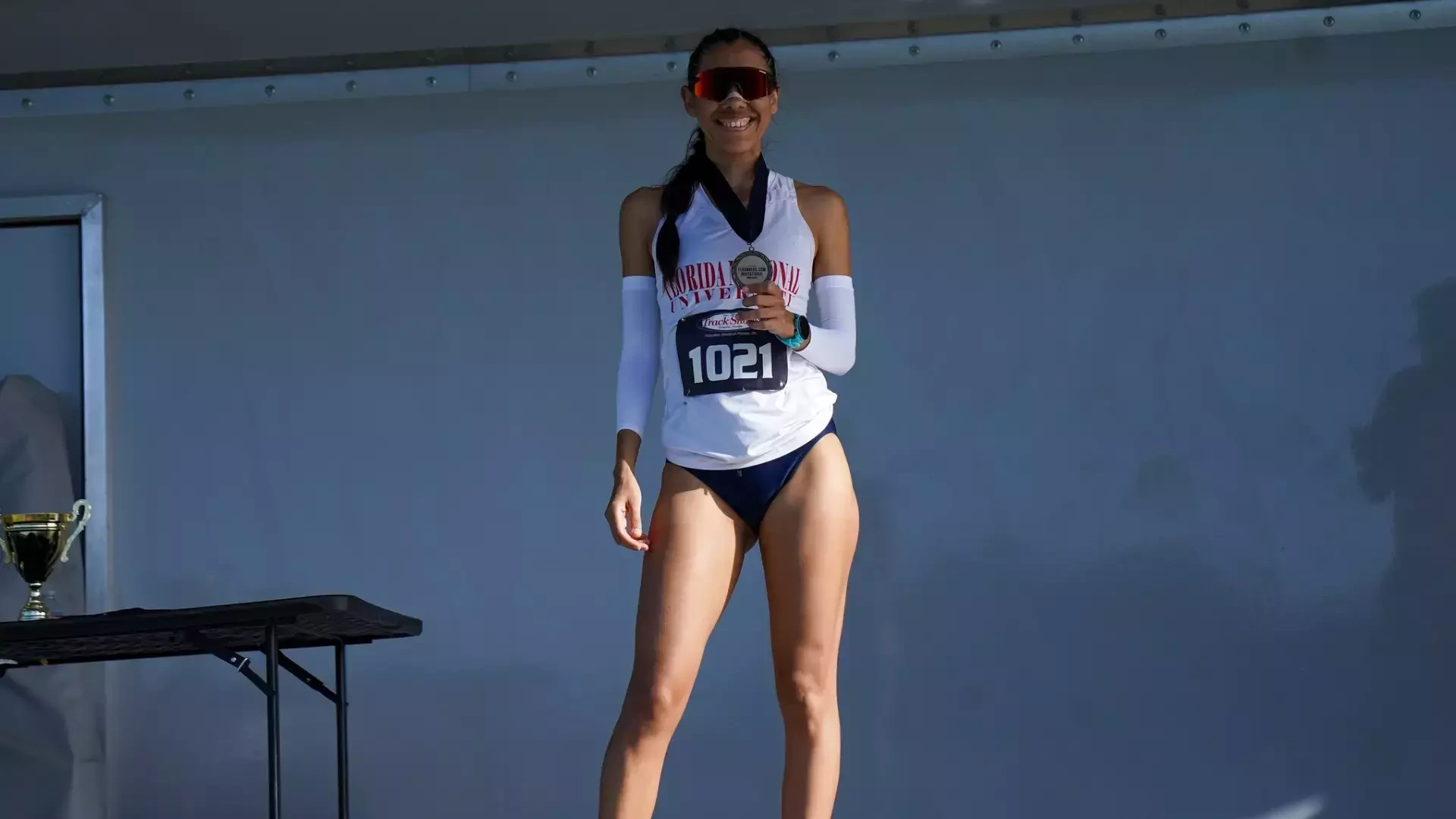 Lismar Bentancourt holding 12th place metal from the the 26th FLRunners.com Invitational.