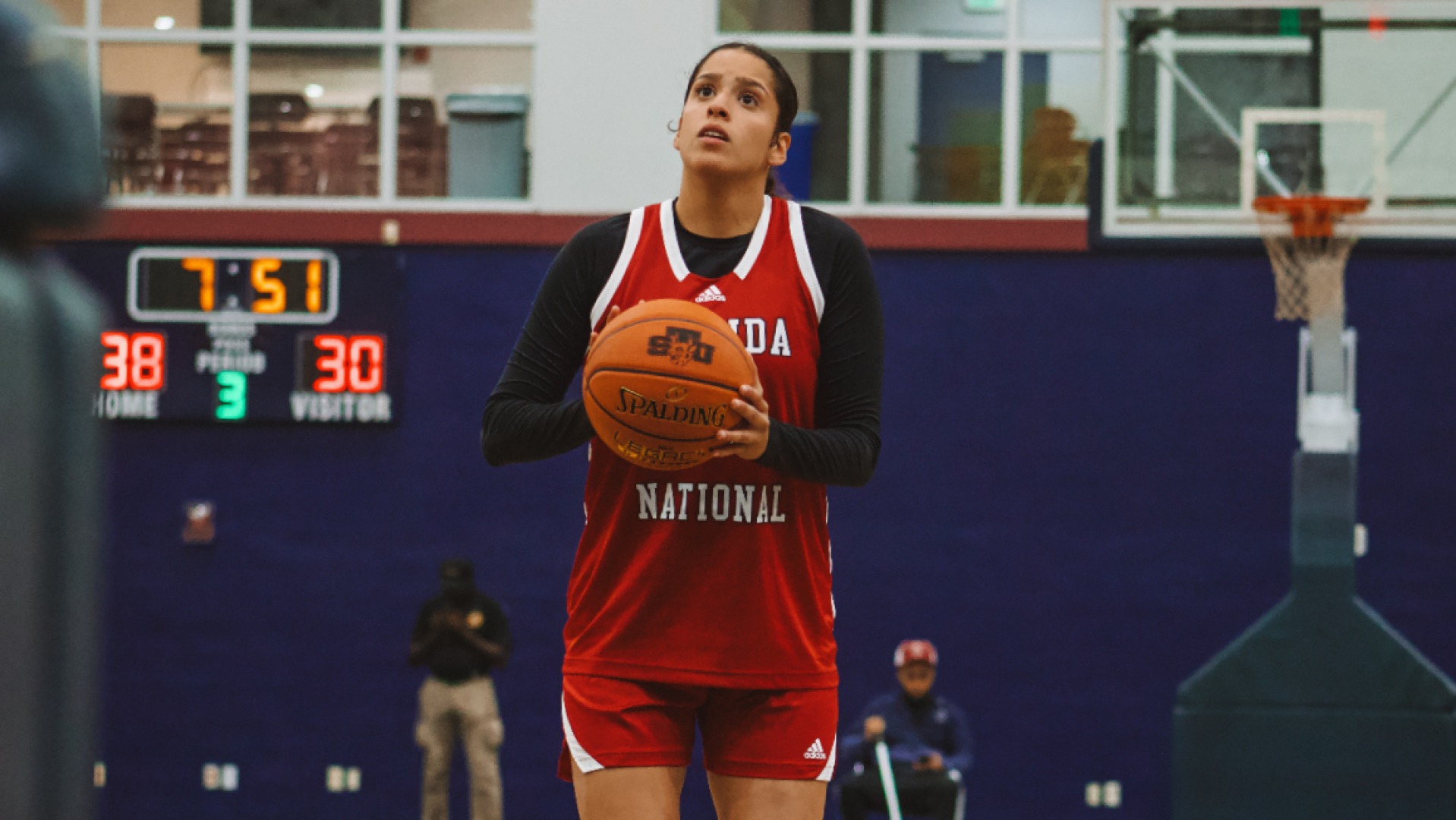 Maria De Gracia shooting a free throw against St. Thomas 2025-26