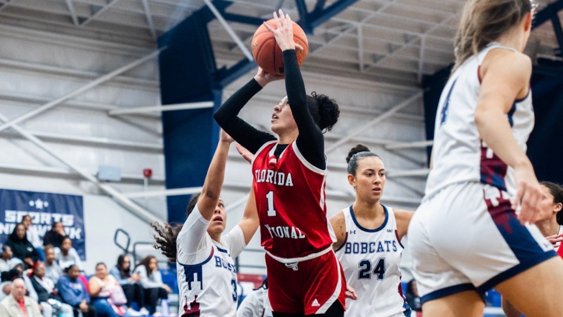 Valeria Cifuentes going for a layup against St. Thomas University 2025-26