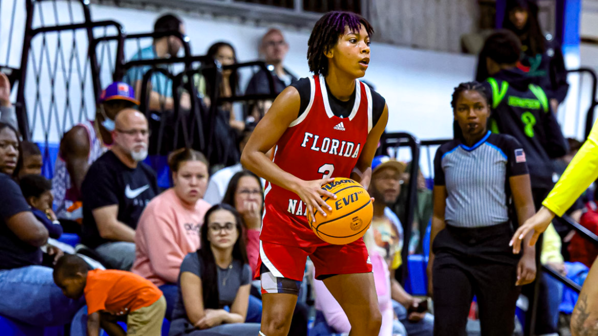 Lamaria Williams running a play against Trinity College of Jacksonville 2025-26