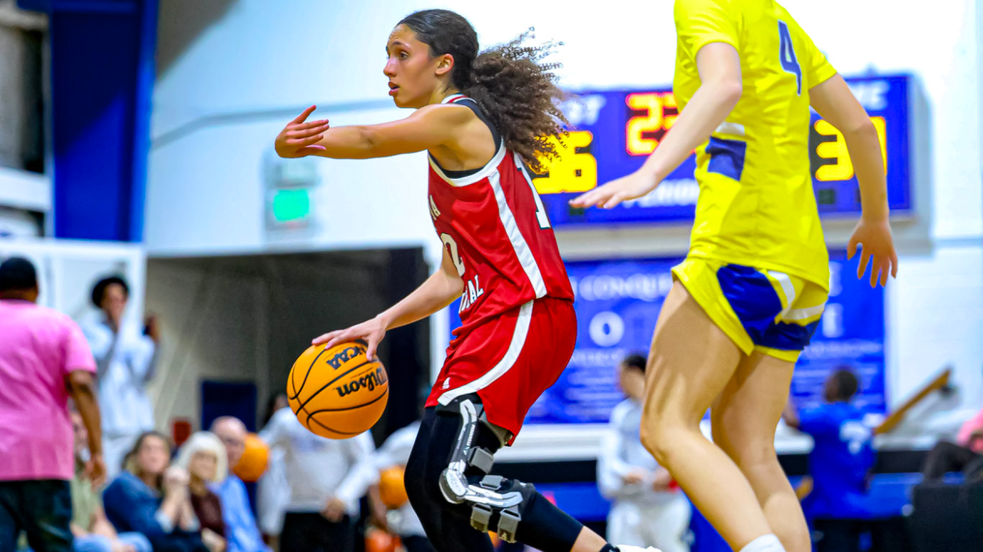 Ziul Gonzalez directing traffic against Trinity College of Jacksonville 2025-26