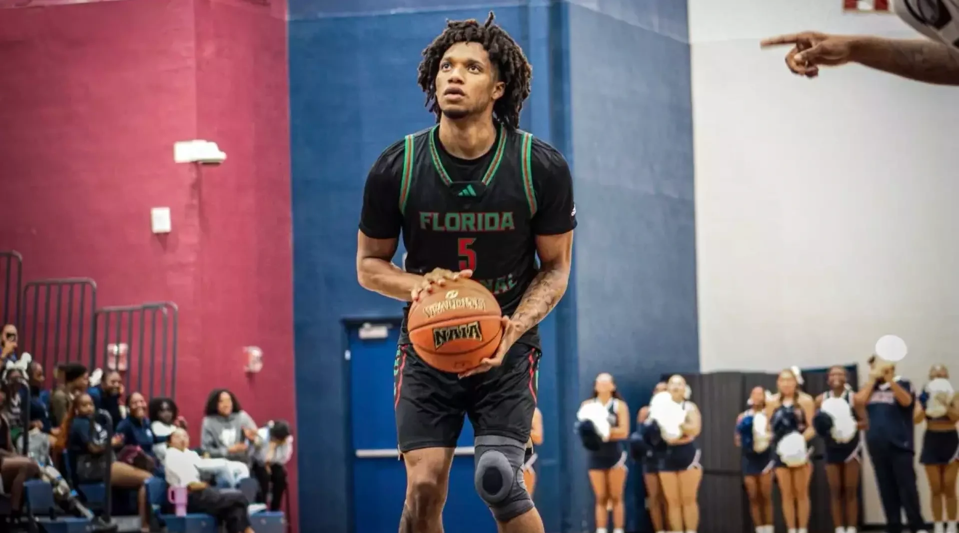 Cameron Johnson shooting a free throw against STU on the road 2024-25