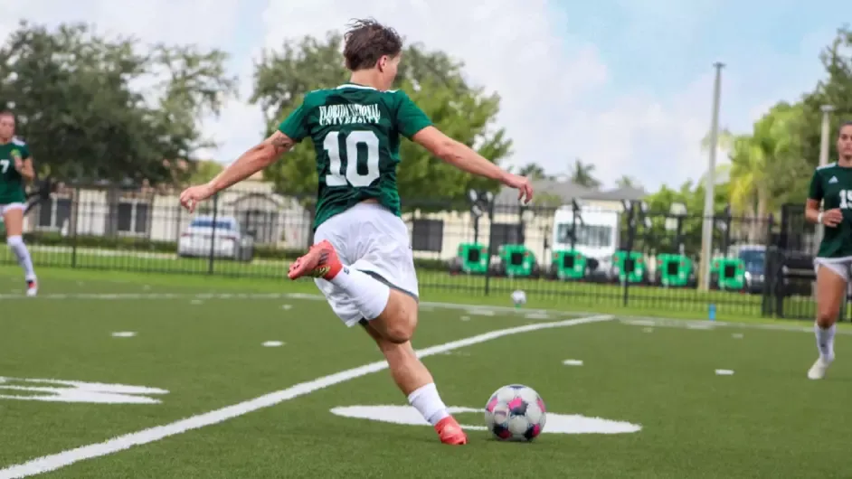 Mara Graef against Florida Memorial 2026, running with the ball, looking to play it in the box. 