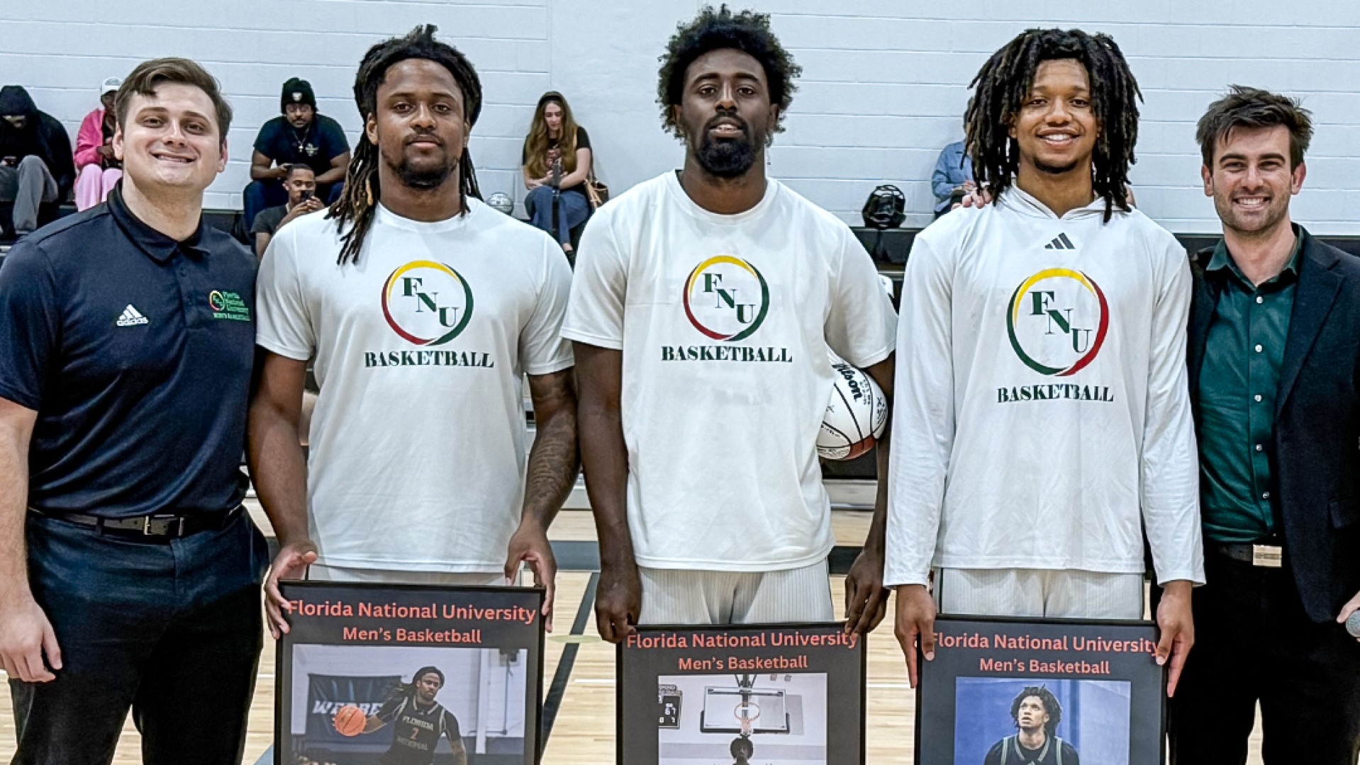 Trevon Clark, Gary Adams and Cameron Johnson posing for Senior Night pictures 2025-26