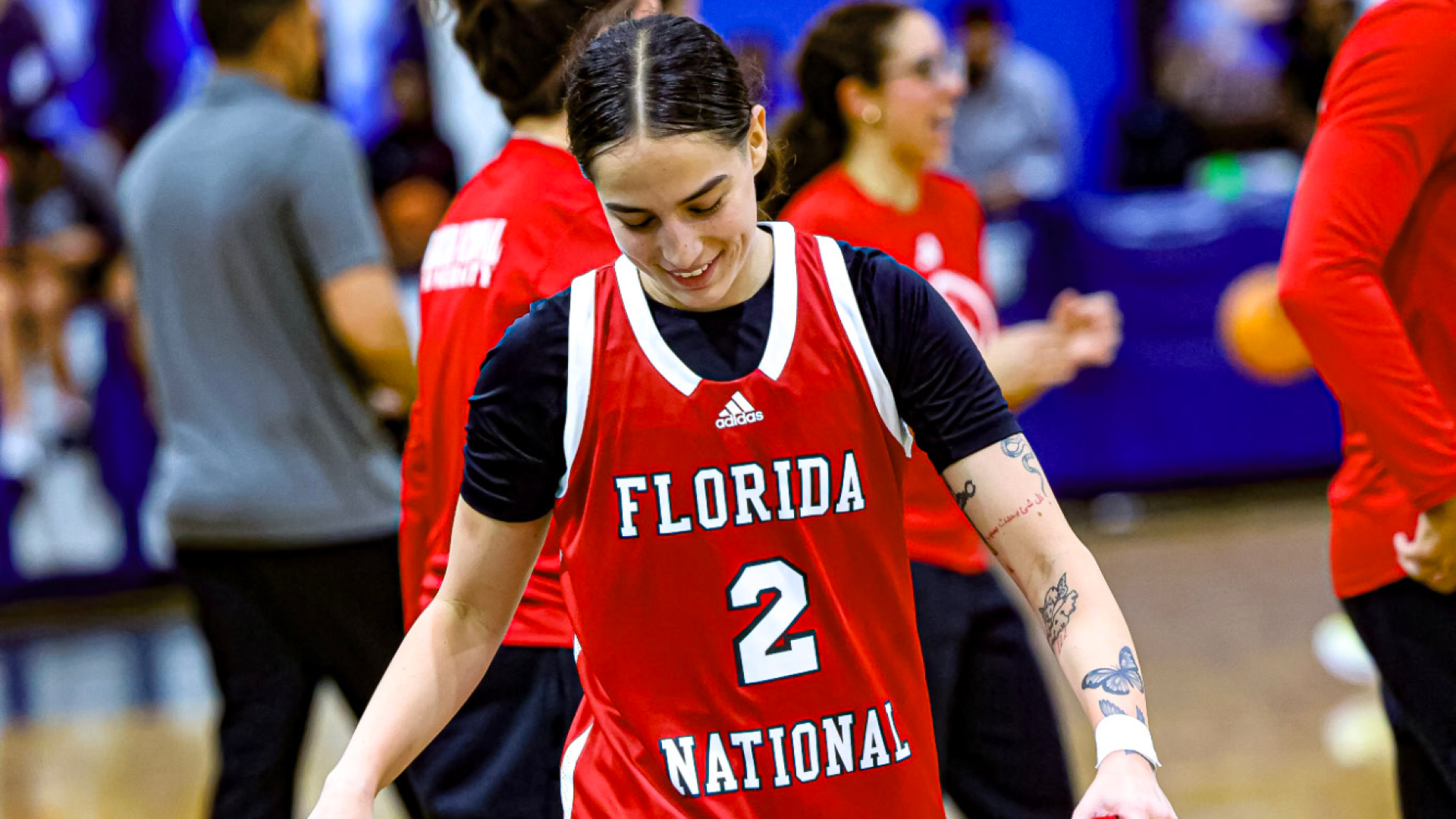 Kaylee Llanos laughing after defeating Trinity College of Jacksonville 2026