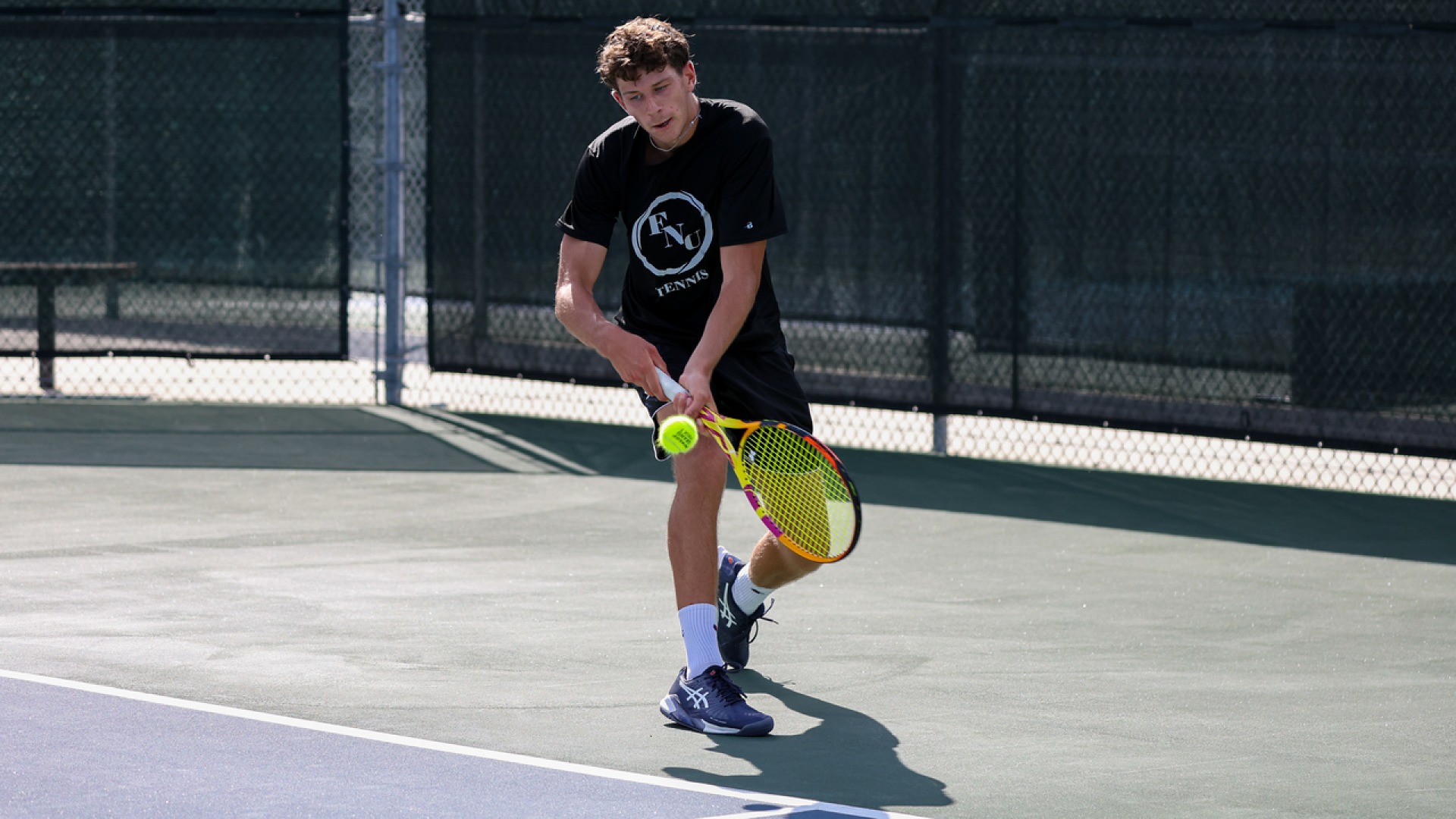 Lukas Nico Kopitzki hitting a tennis ball at SEU ITA Tournament 2025-26