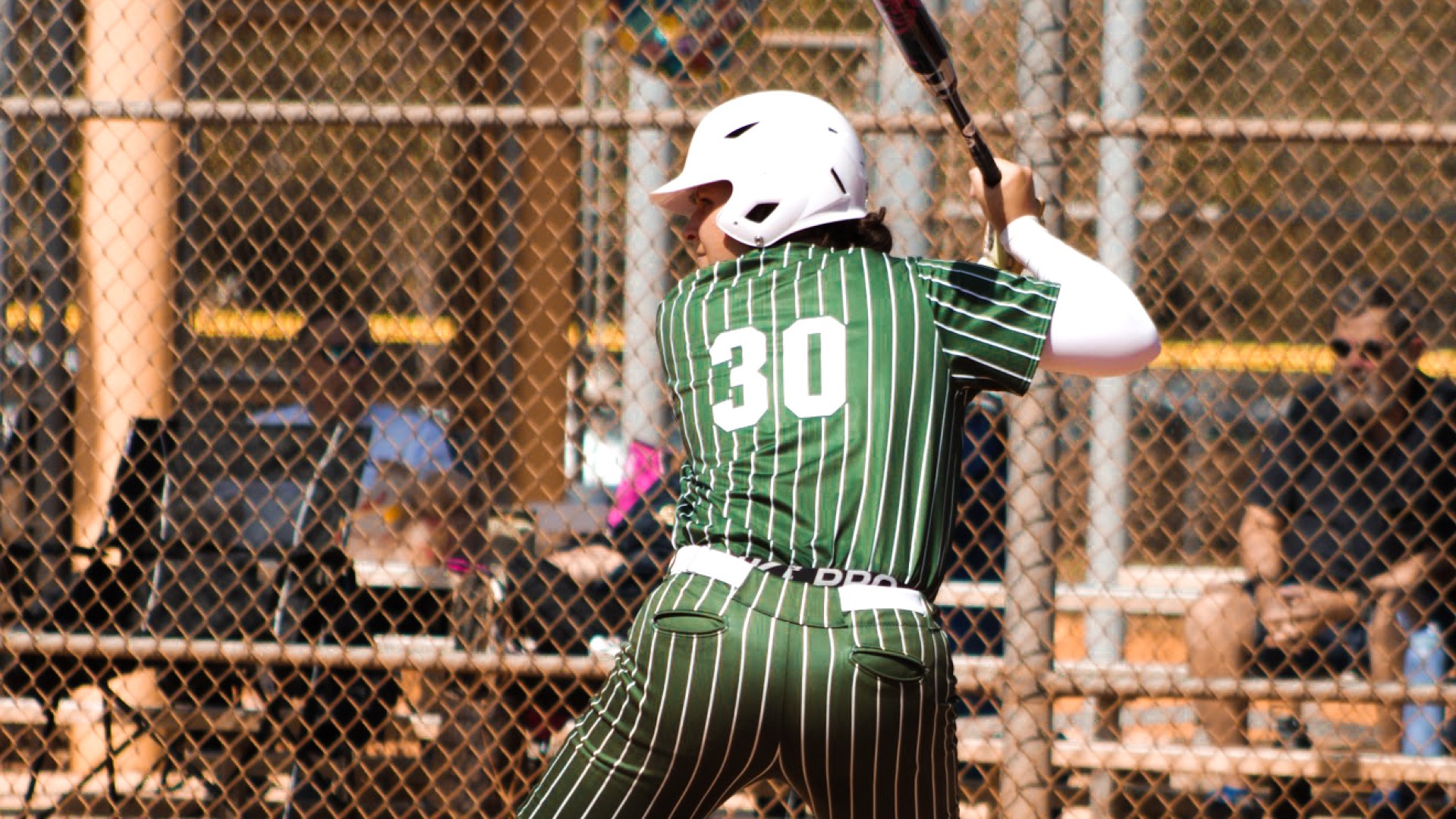 Alisha Lanyon hitting in home opener against New College of Florida 2026