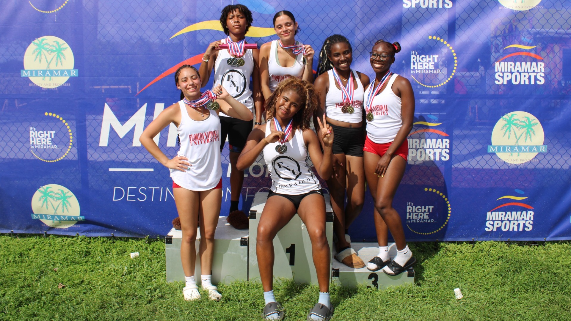 FNU women's track and field team photo at CAC Championship 2026