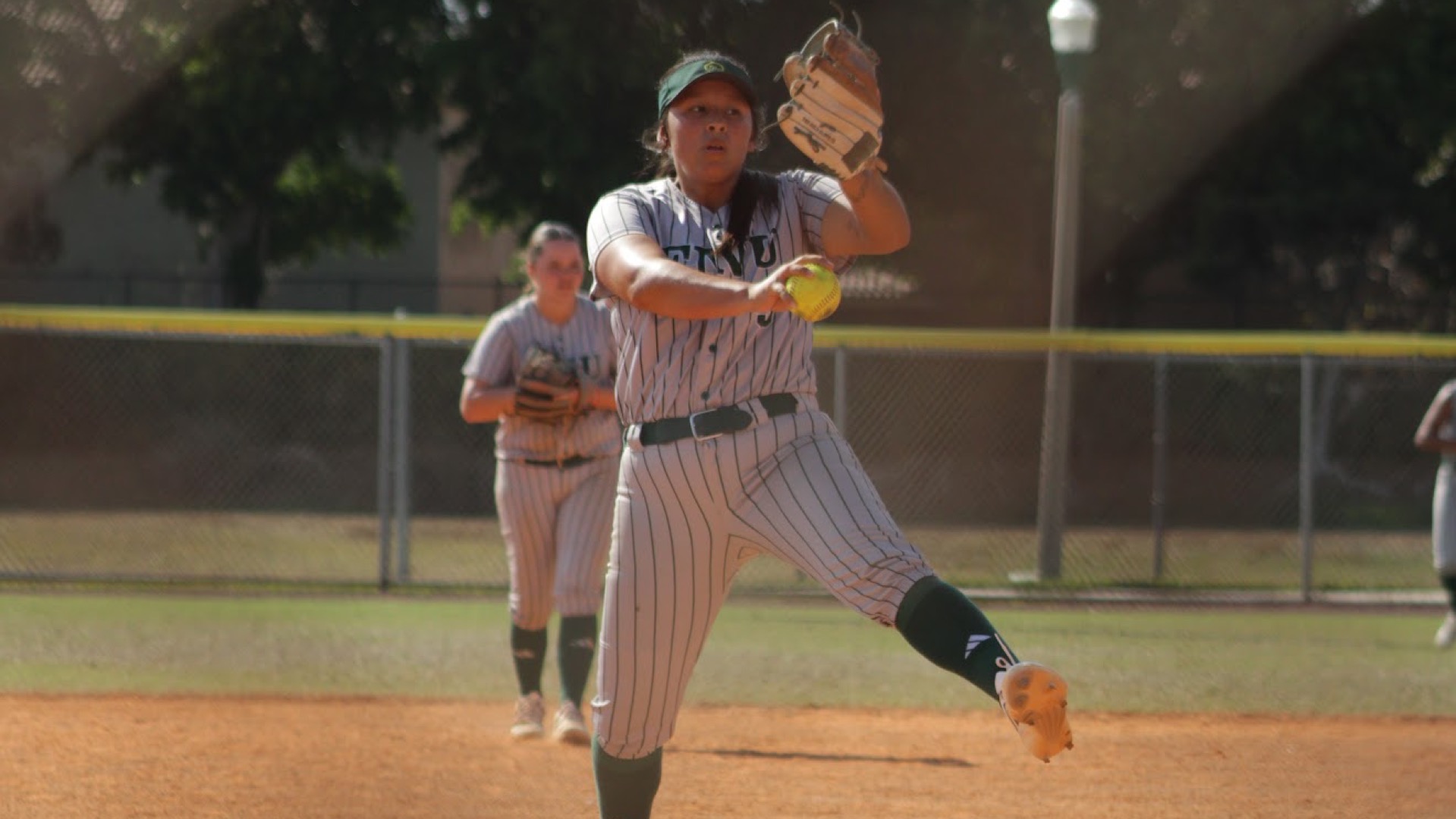 Brunella Beteta throwing a pitch against Mount Mercy