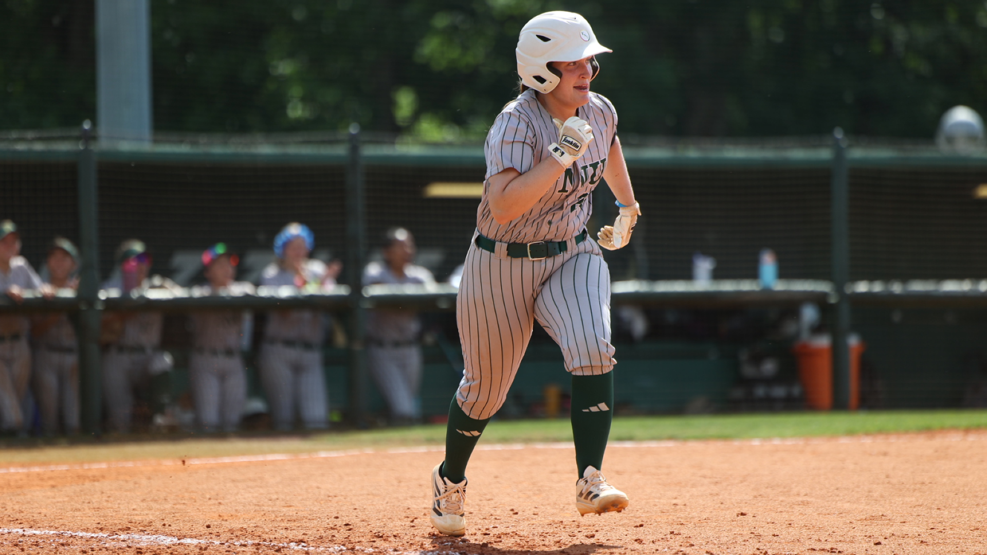 Carollann McClelland running to first base for a single against Westcliff University at the 2026 CAC Tournament.