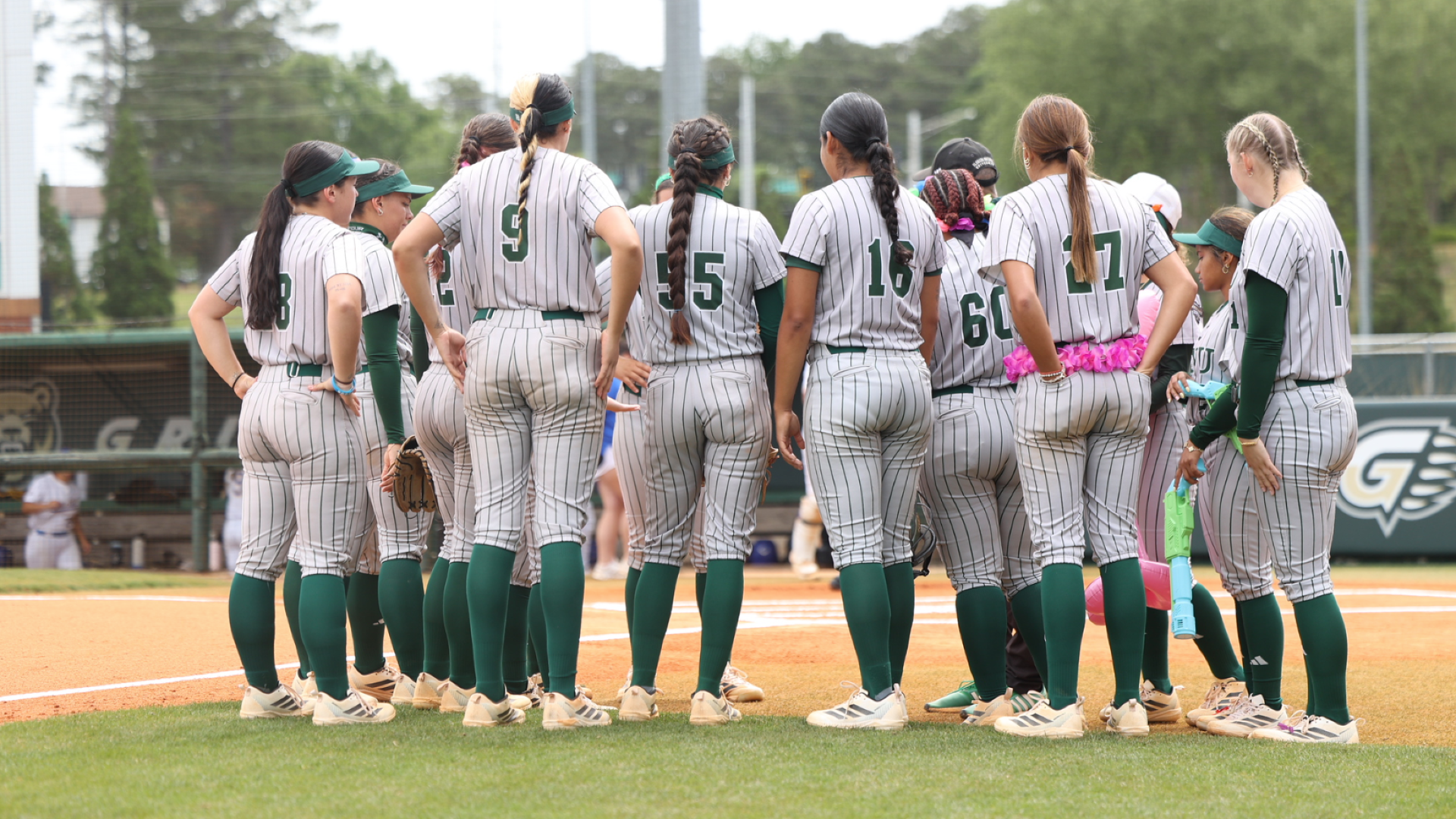 FNU softball in a huddle during the 2026 CAC Tournament