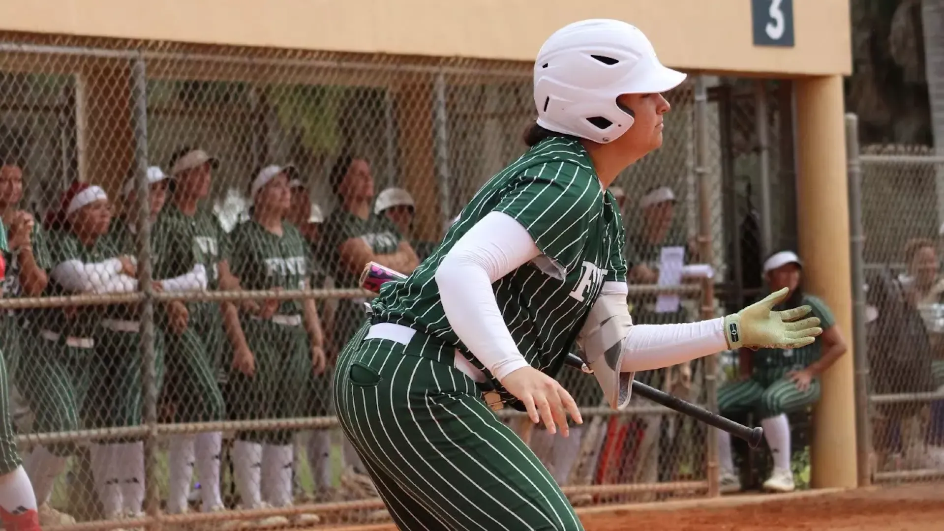 Alisha Lanyon dropping bat after scoring a hit against Florida Memorial 2026