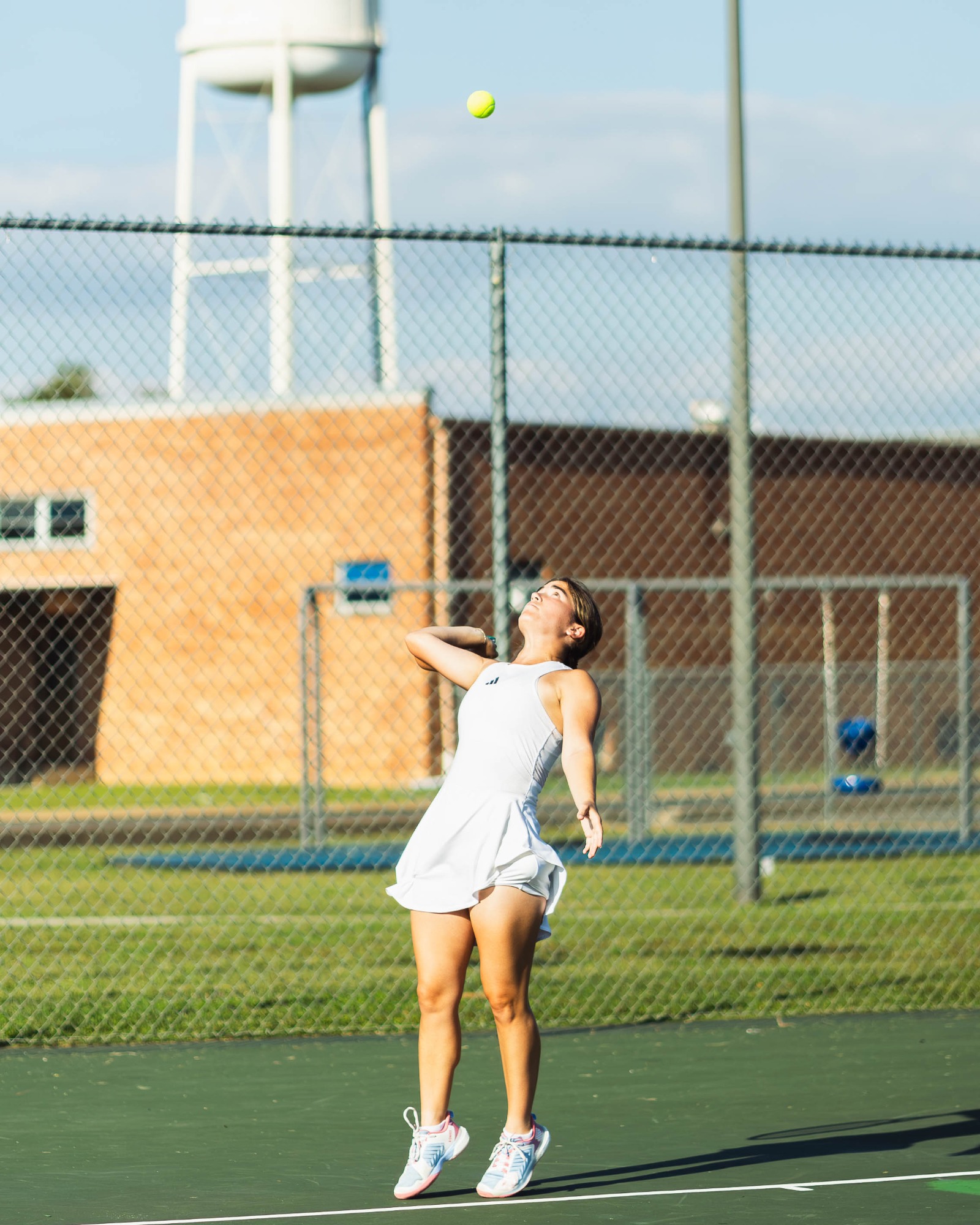 FHU Lady Lion tennis in action