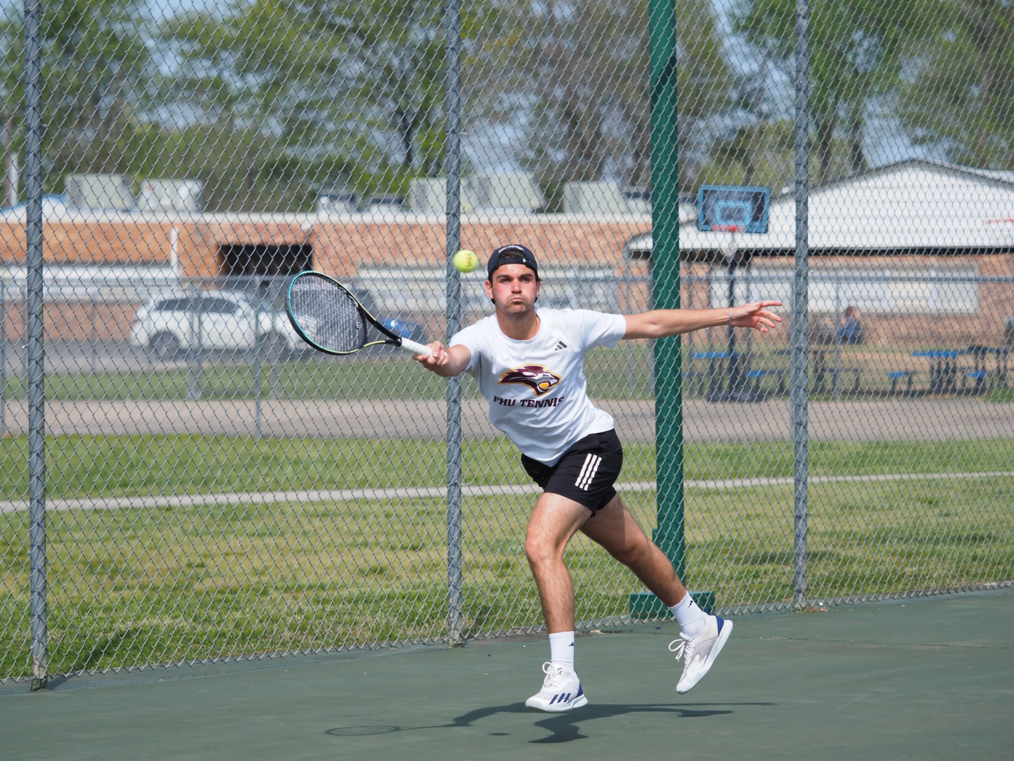 FHU tennis in action