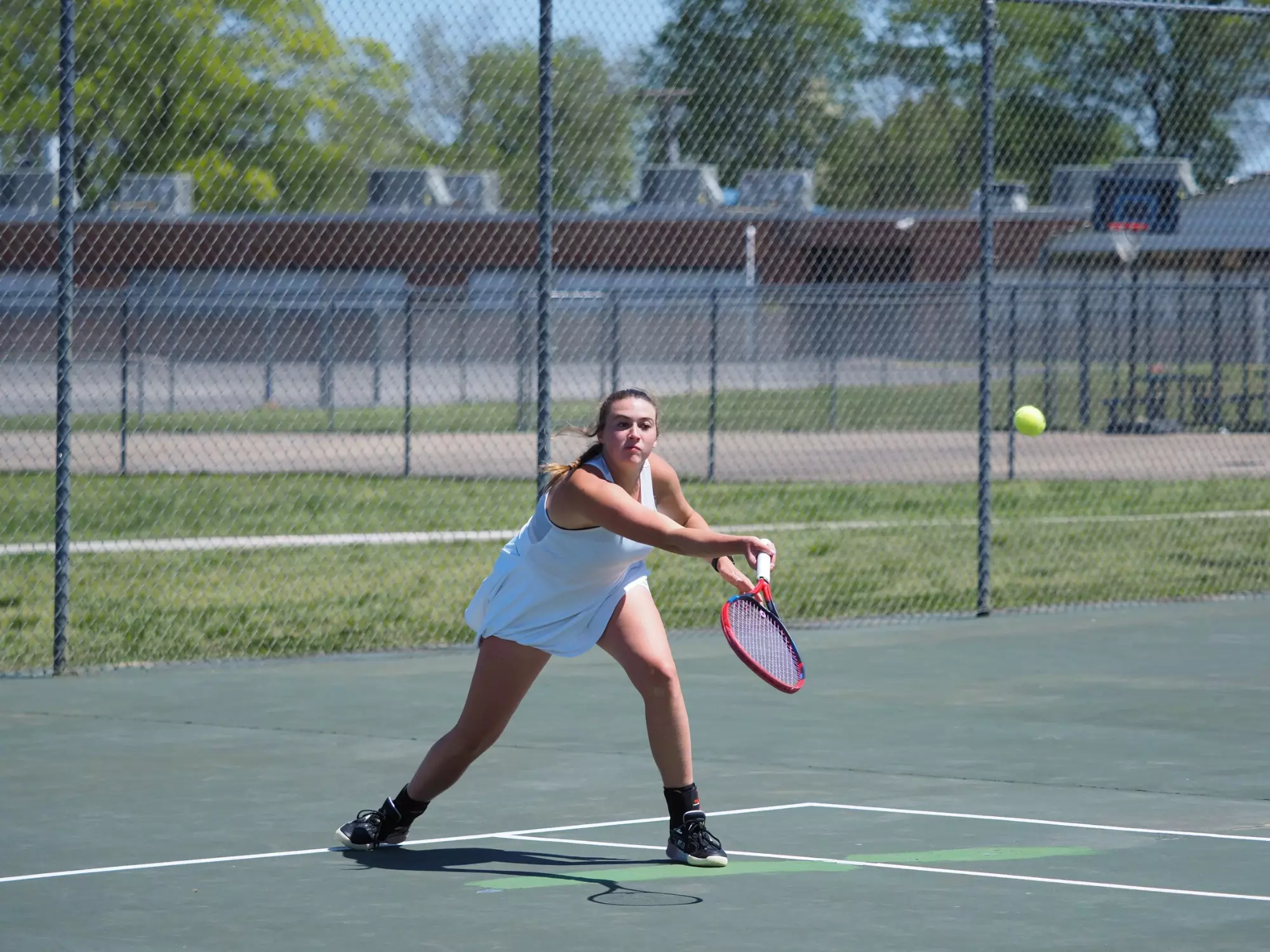 FHU tennis in action