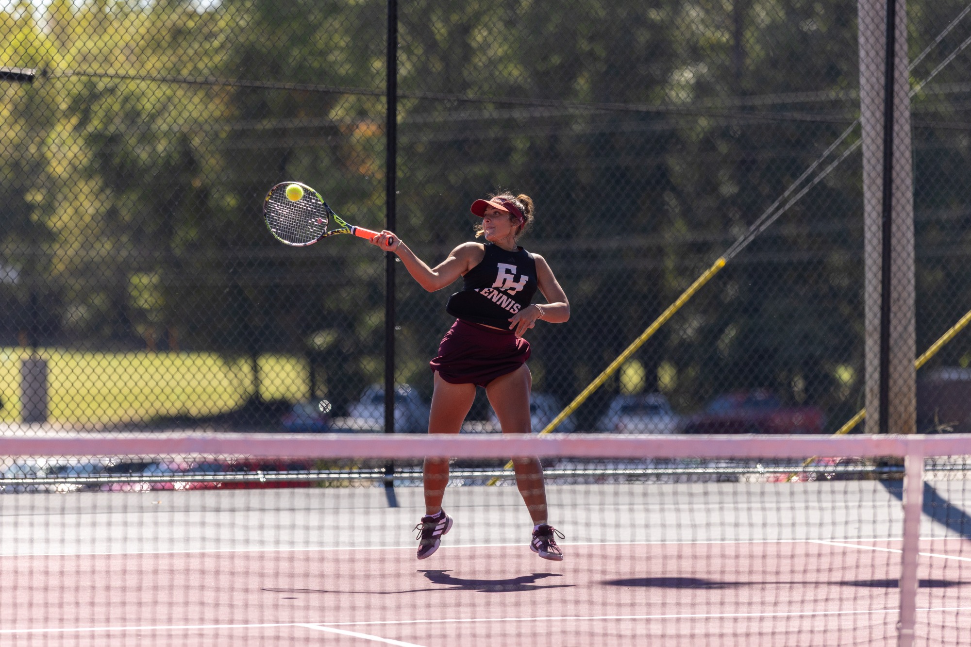 Angie Palmerin in FHU's women's tennis match against Blue Mountain Christian on October 6, 2026.