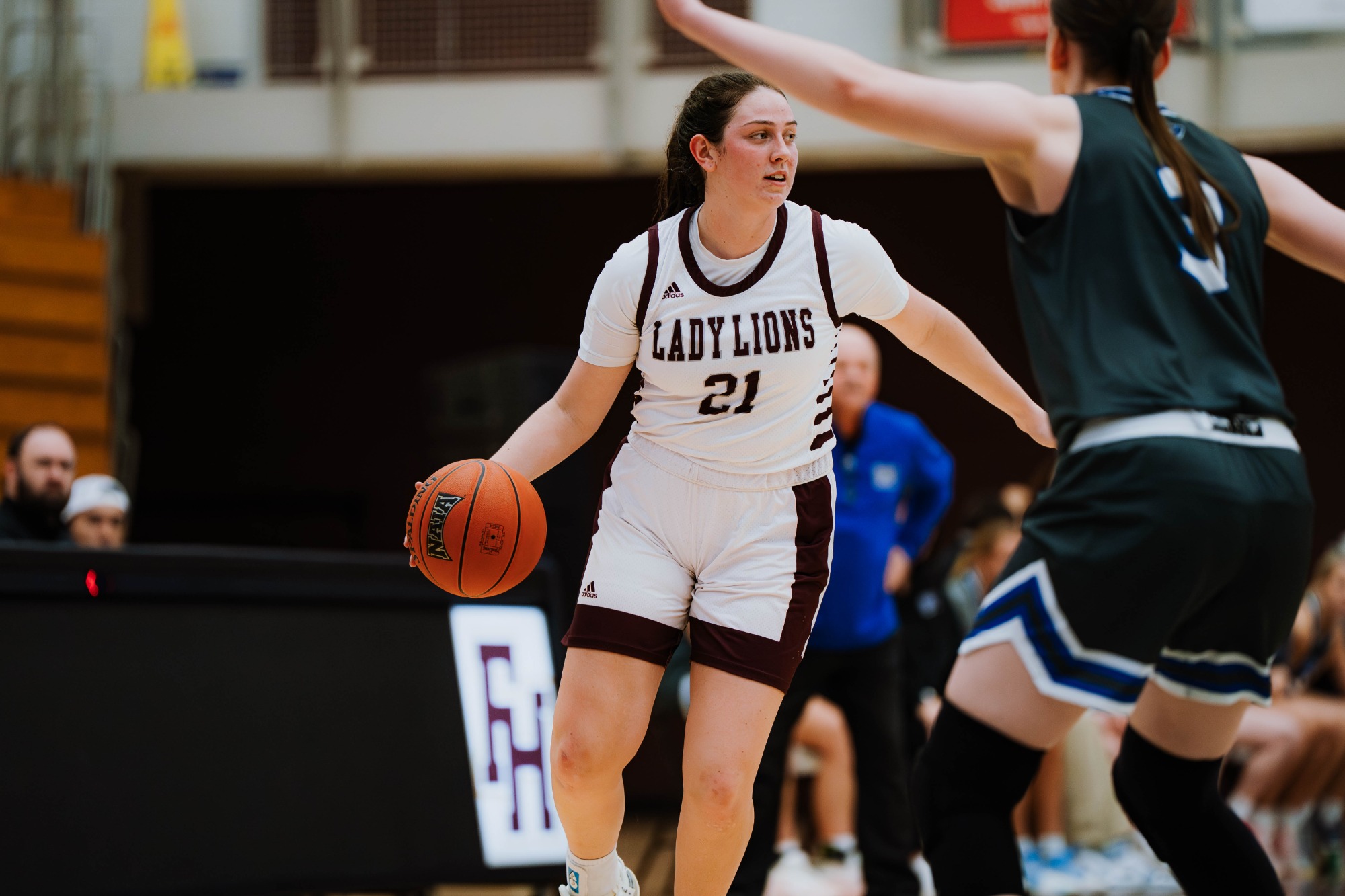 Lady Lion basketball in action