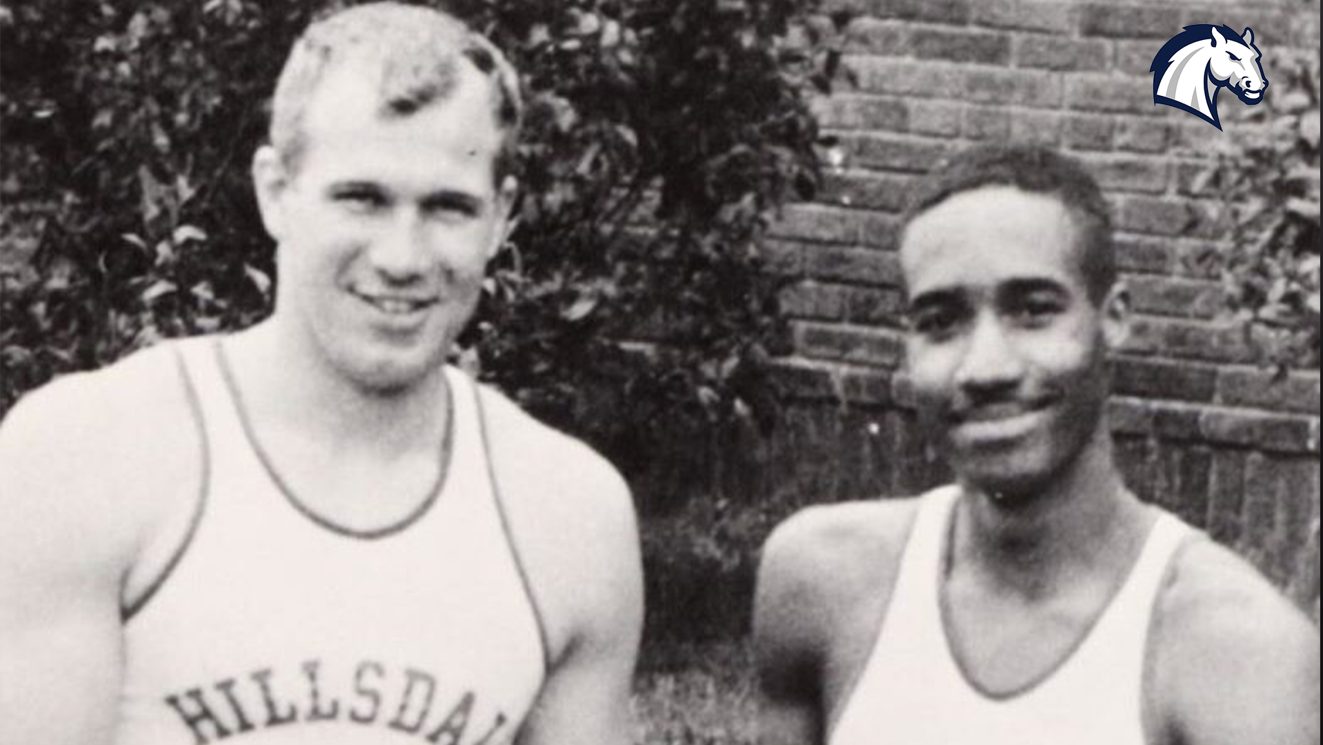 Larry Covey (left) poses with track and field teammate Gene Jordan during a photo taken in the early 60s at Hillsdale College.