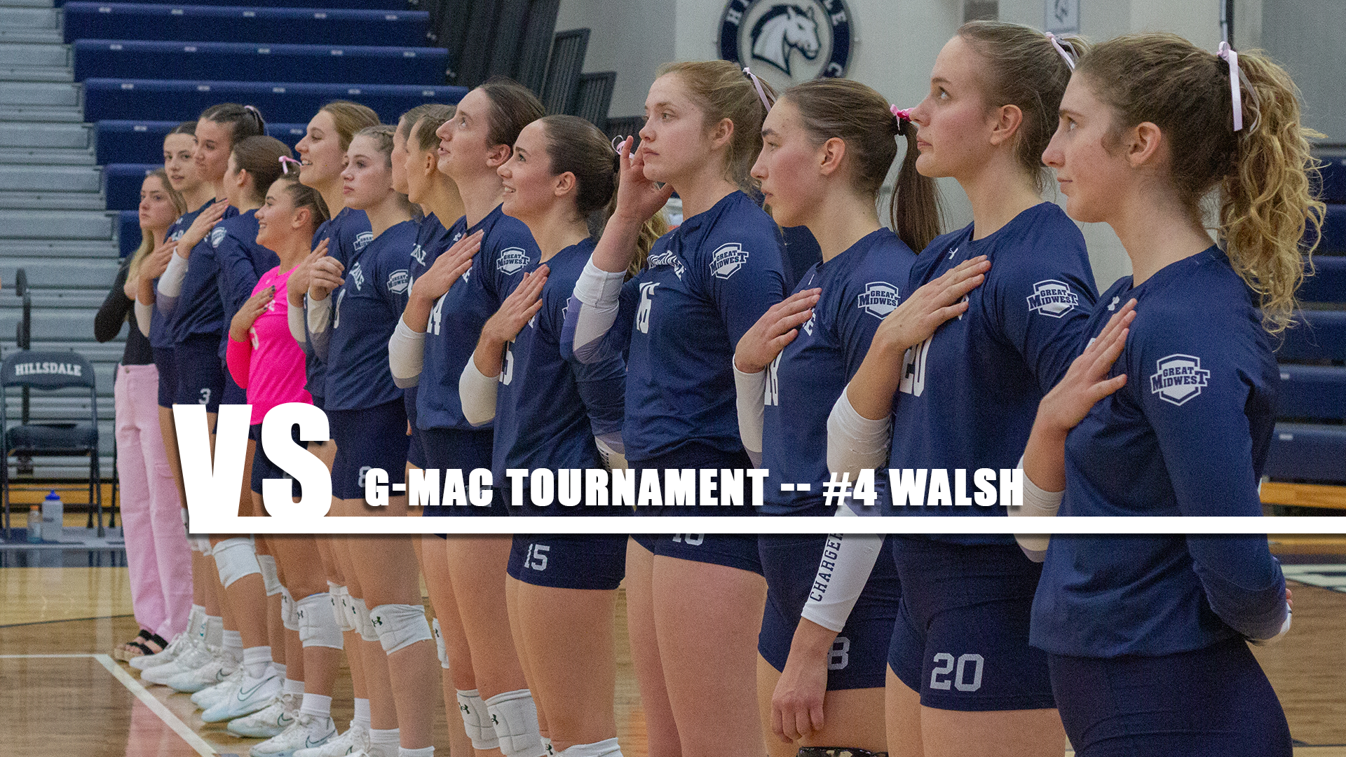 Hillsdale's team stands at attention for the national anthem before a match against Walsh on Nov. 7, 2025.