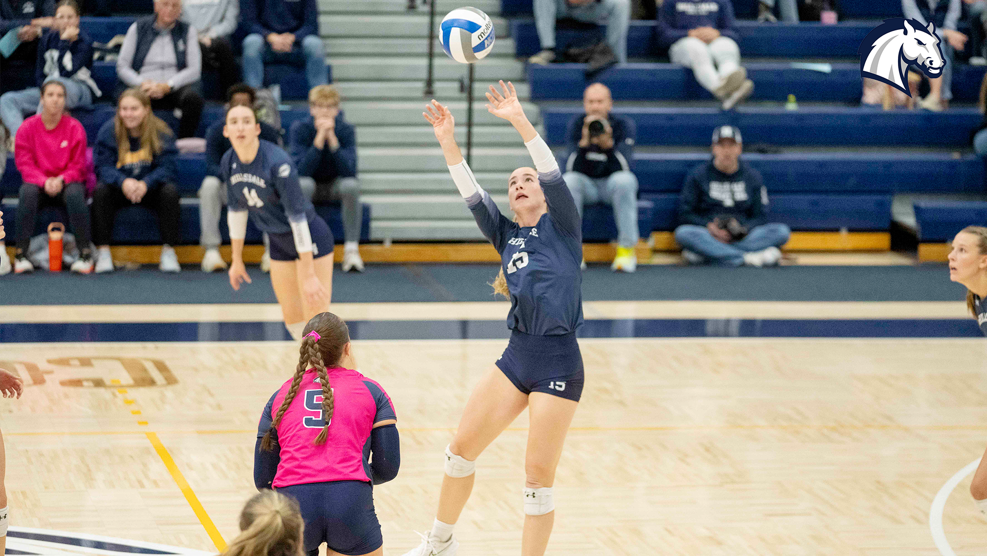 Hillsdale's Josie TeSlaa sets the ball on the run in Hillsdale's G-MAC semifinal match against Cedarville on Nov. 21, 2025.