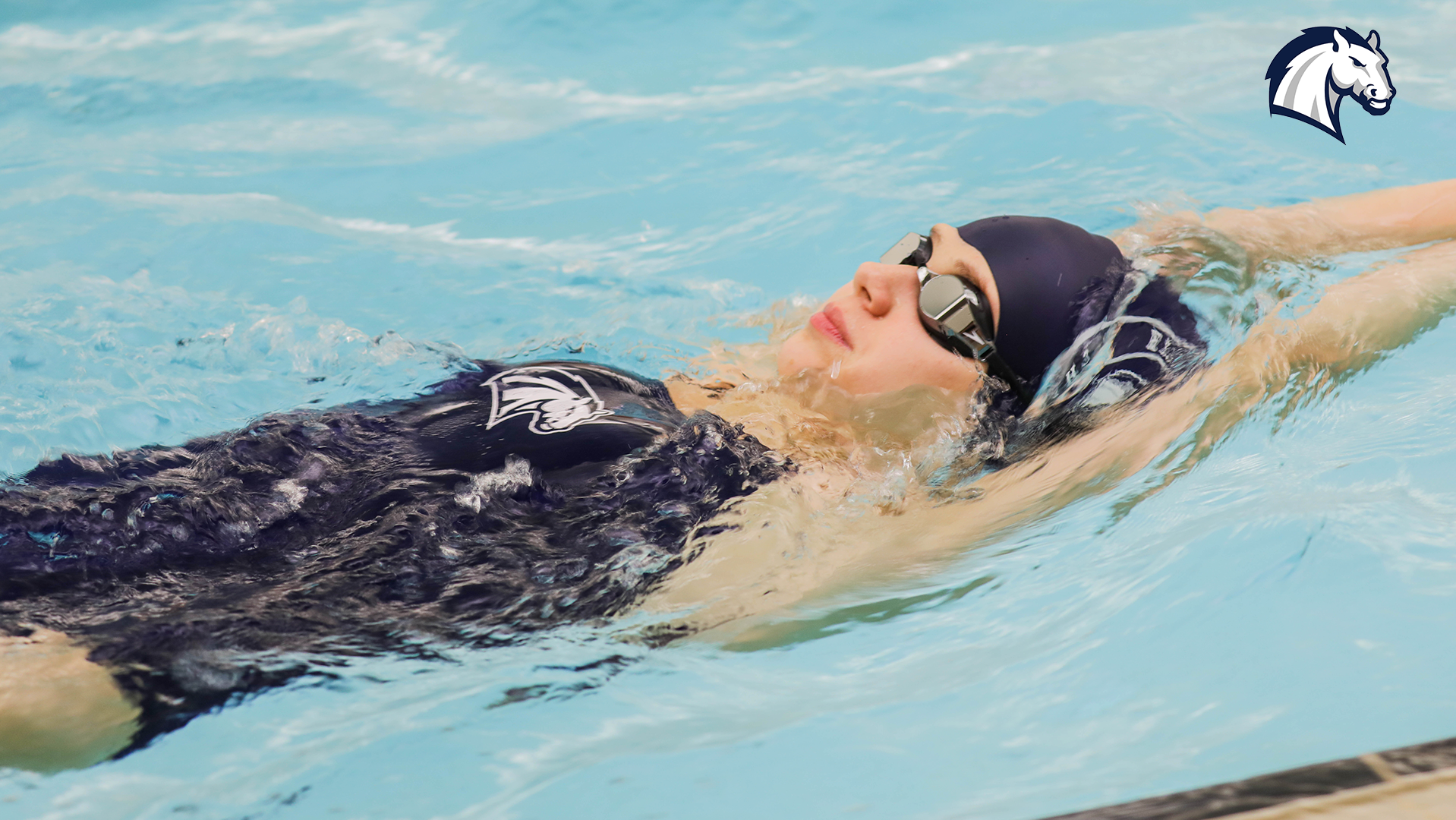 Sasha Babenko competes in the backstroke at the Oberlin Invite on Oct. 10, 2025.
