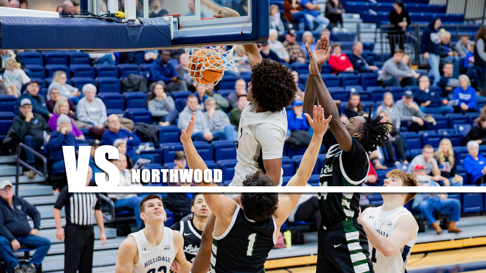 Hillsdale's Braylon Morris throws down a dunk against Lake Erie on Dec. 6, 2025.