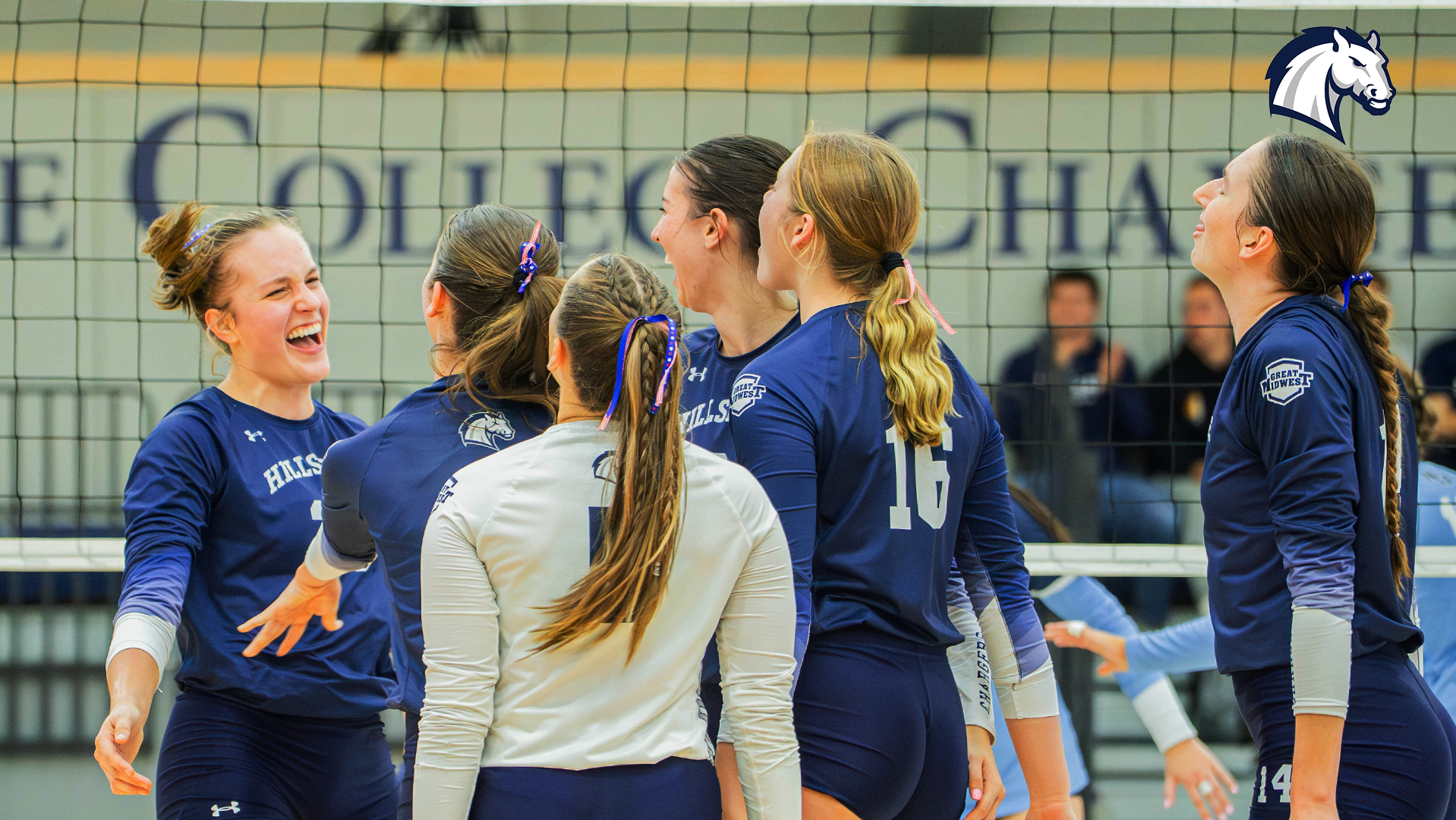 Hillsdale's volleyball team celebrates a point against Northwood on Oct. 25, 2025.