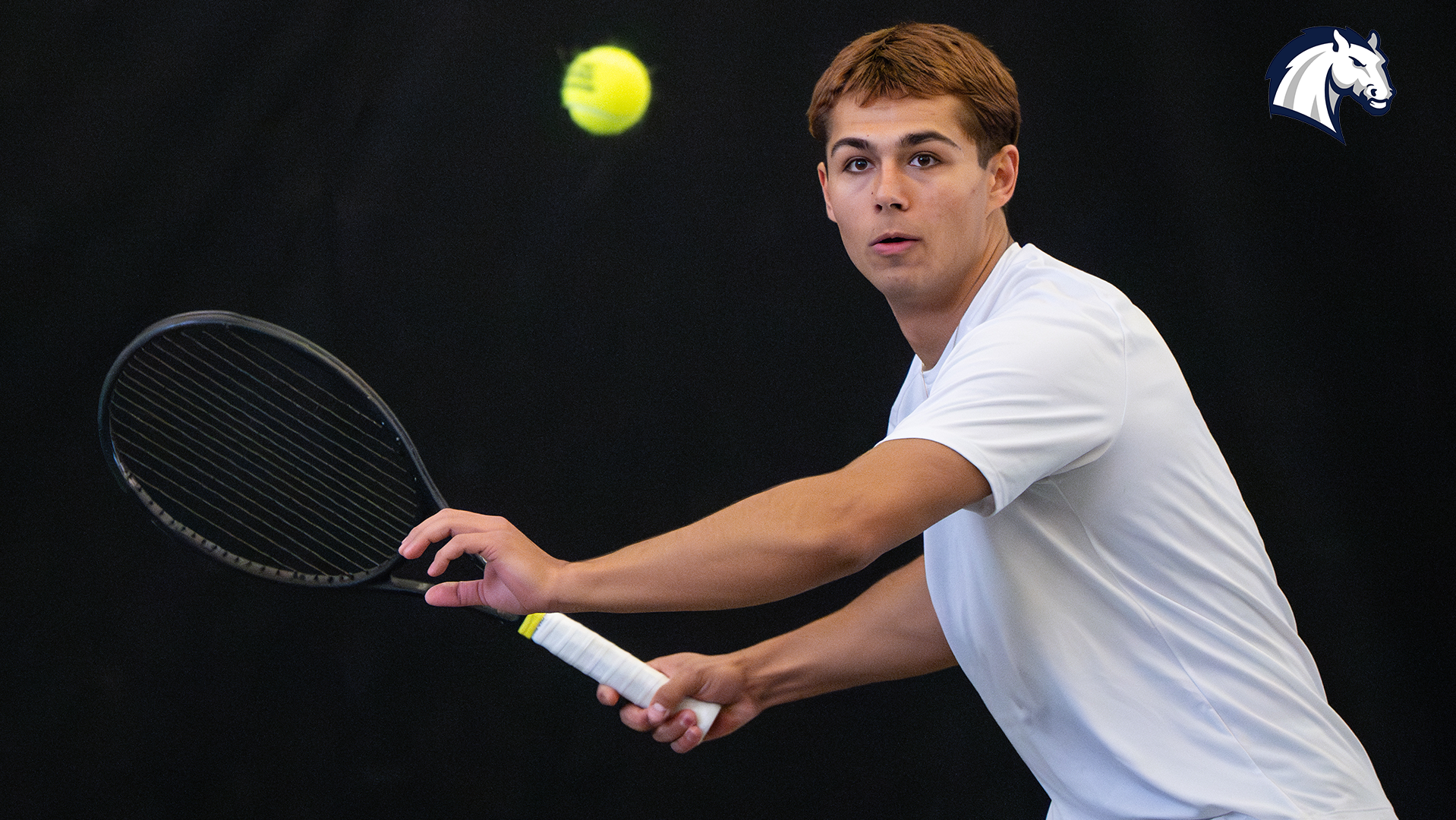 Hillsdale's Ryan Papazov tracks a tennis ball during a match against Northwood on April 12, 2025.