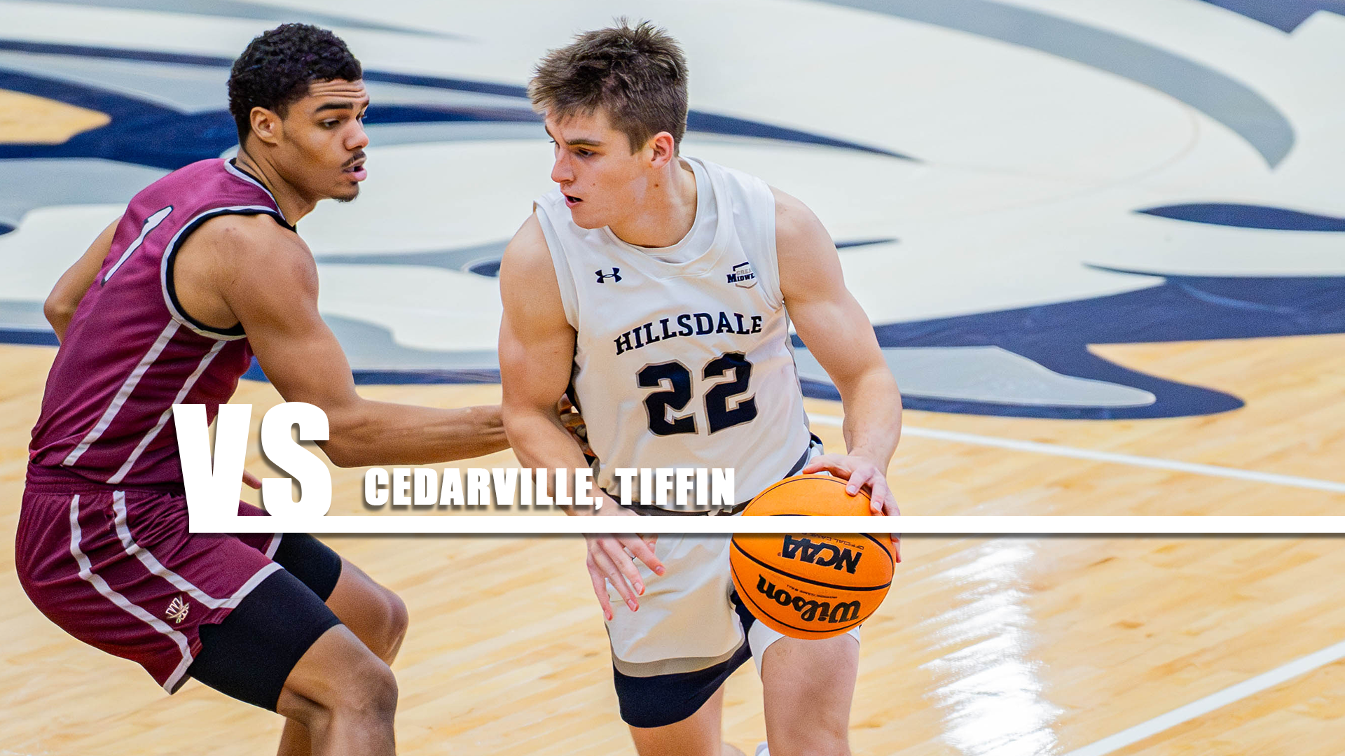Hillsdale's Tommy Morgan drives towards the basket against a Walsh defender during a game on Jan. 5, 2026.