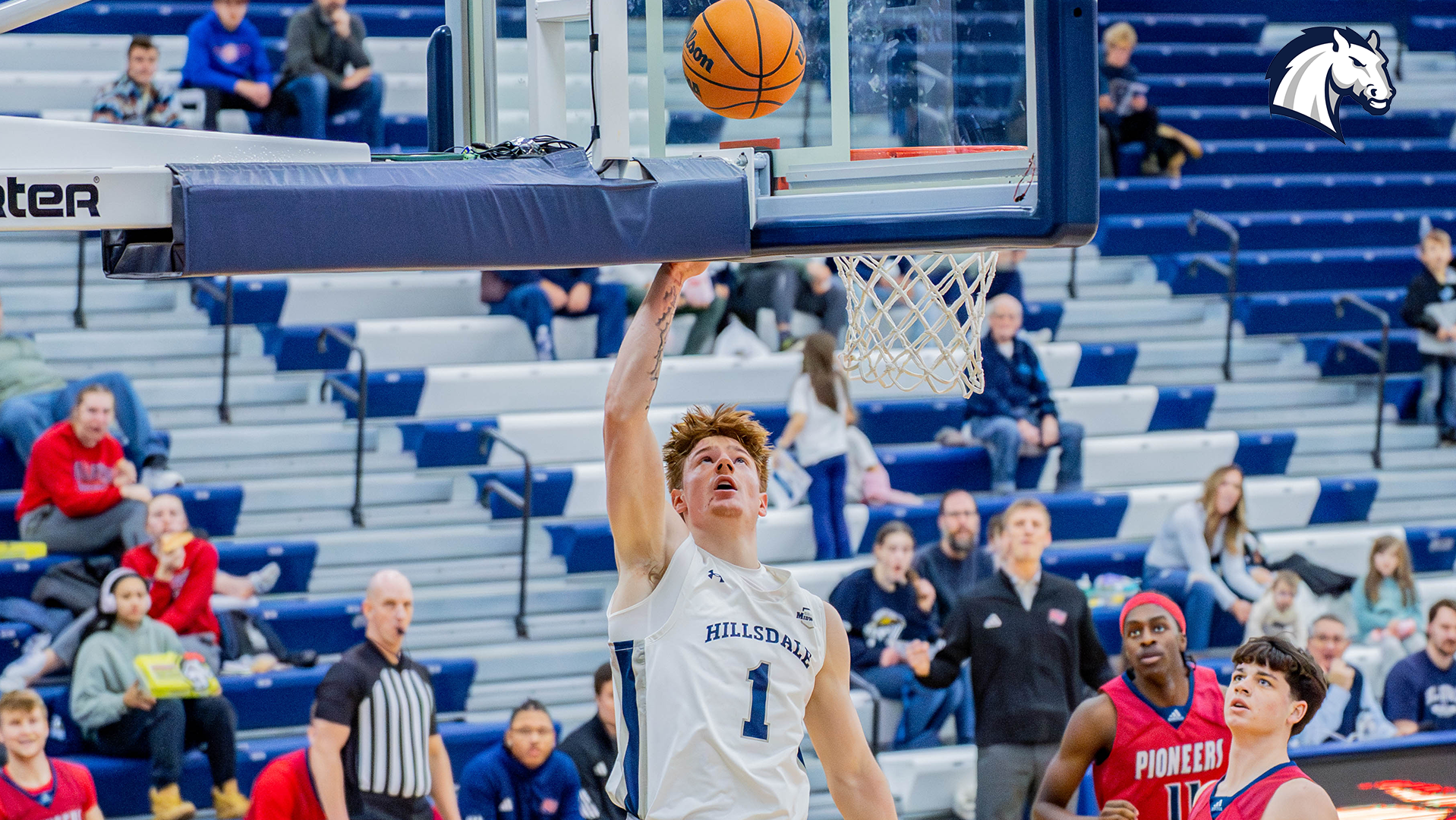 Hillsdale's Caleb Glaser scores on a layup against Malone on Jan. 3, 2026.