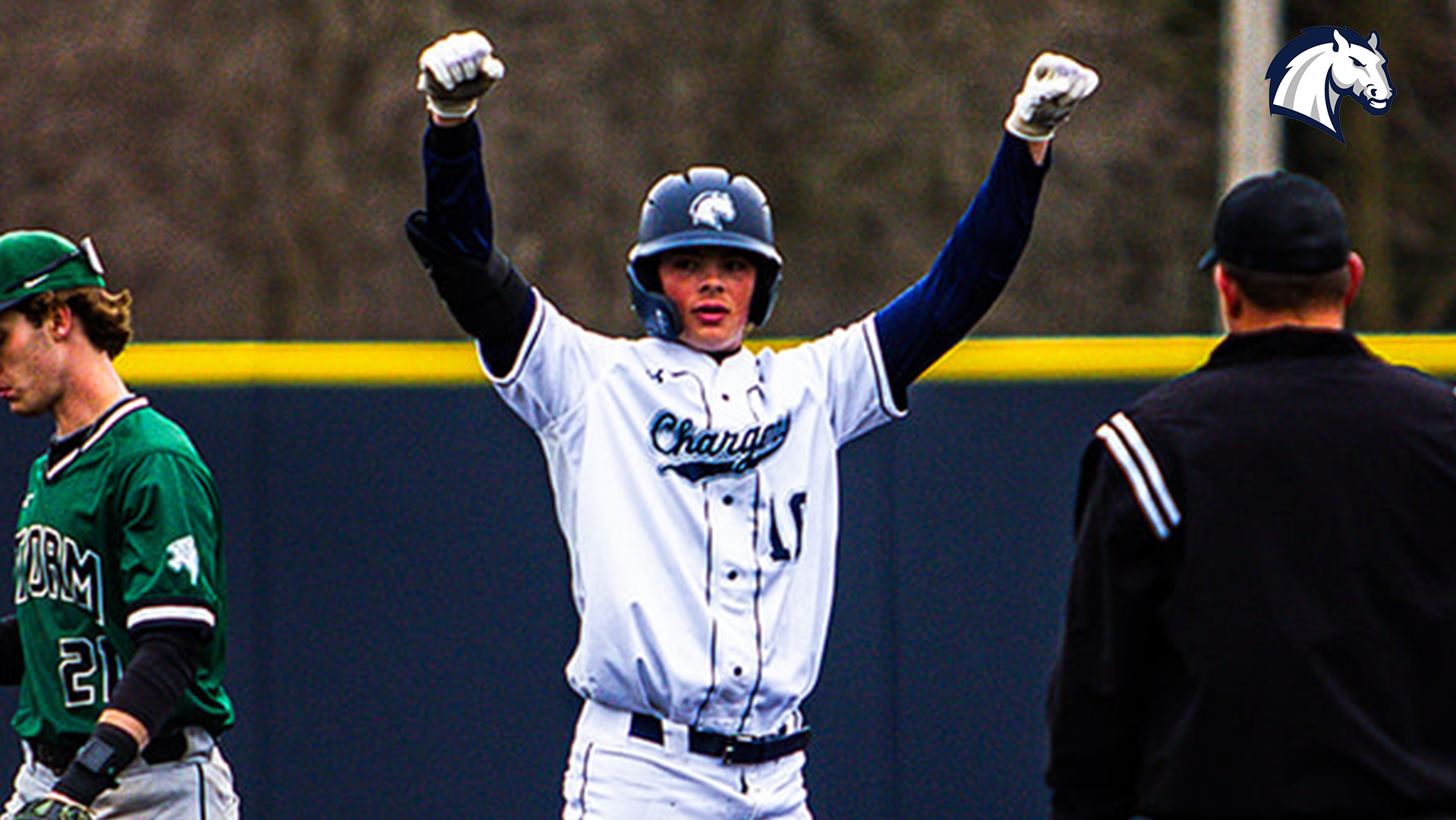 Hillsdale's Gaard Swenson celebrates after hitting a double in a game against Lake Erie in April 2025.